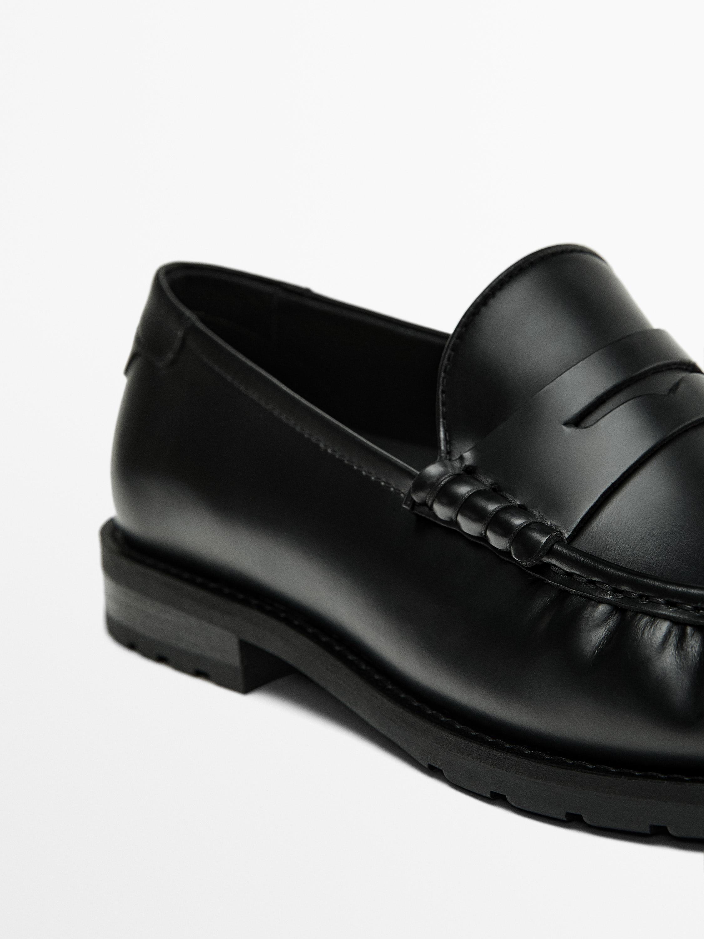 Black leather loafers