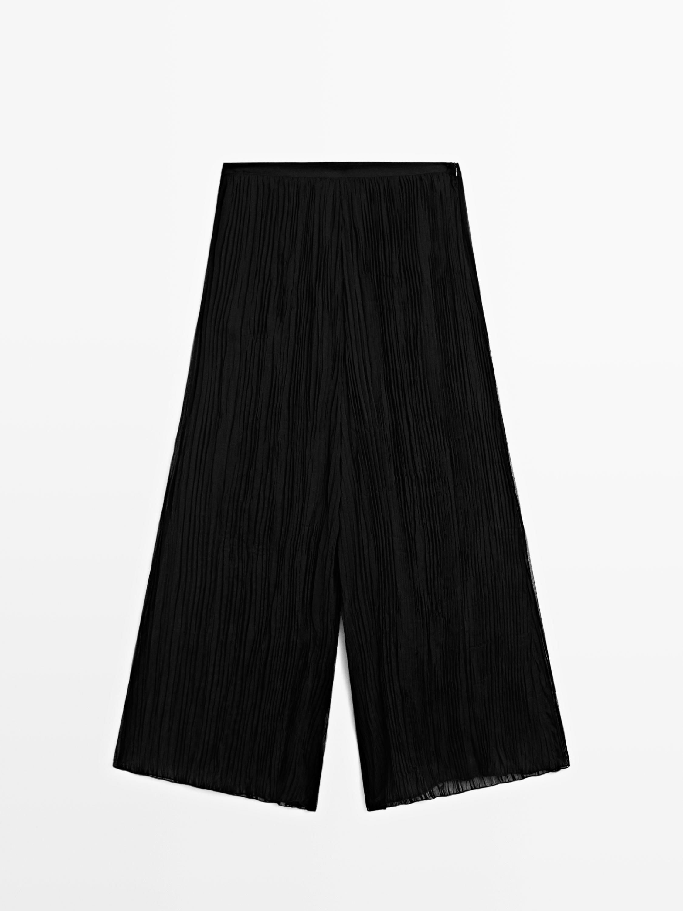 Pantalón ancho plisado
