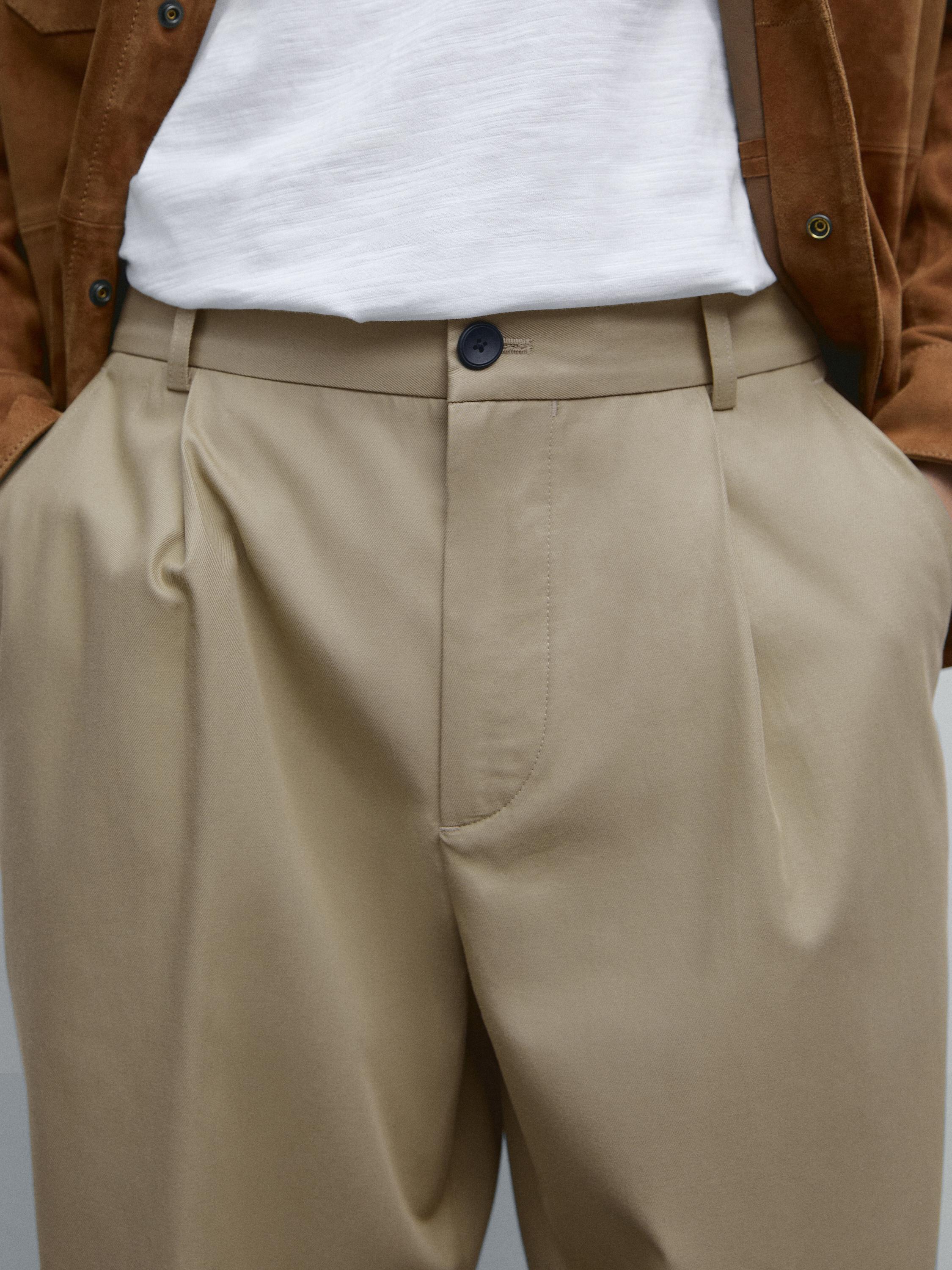 Pantalón relaxed fit detalle pinza
