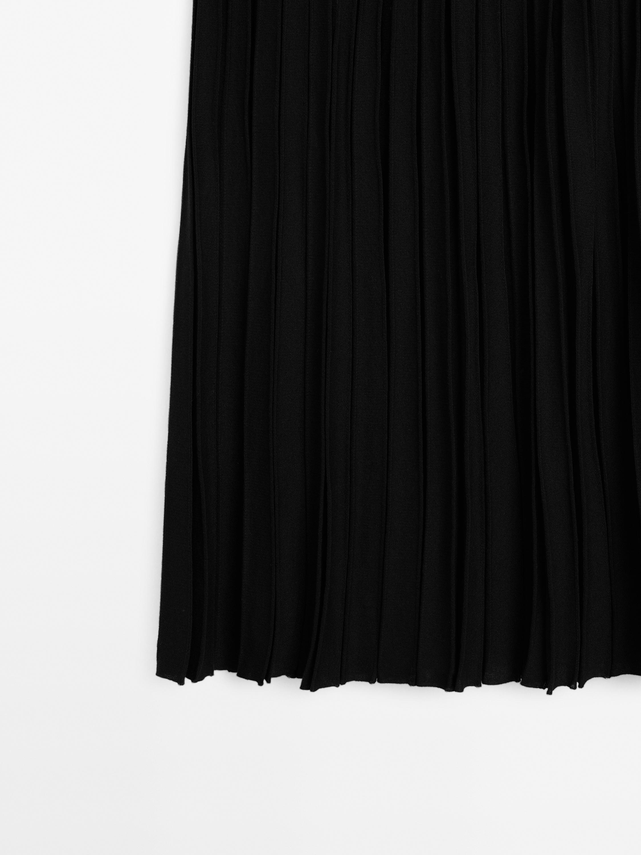 Jupe midi plissée transparences