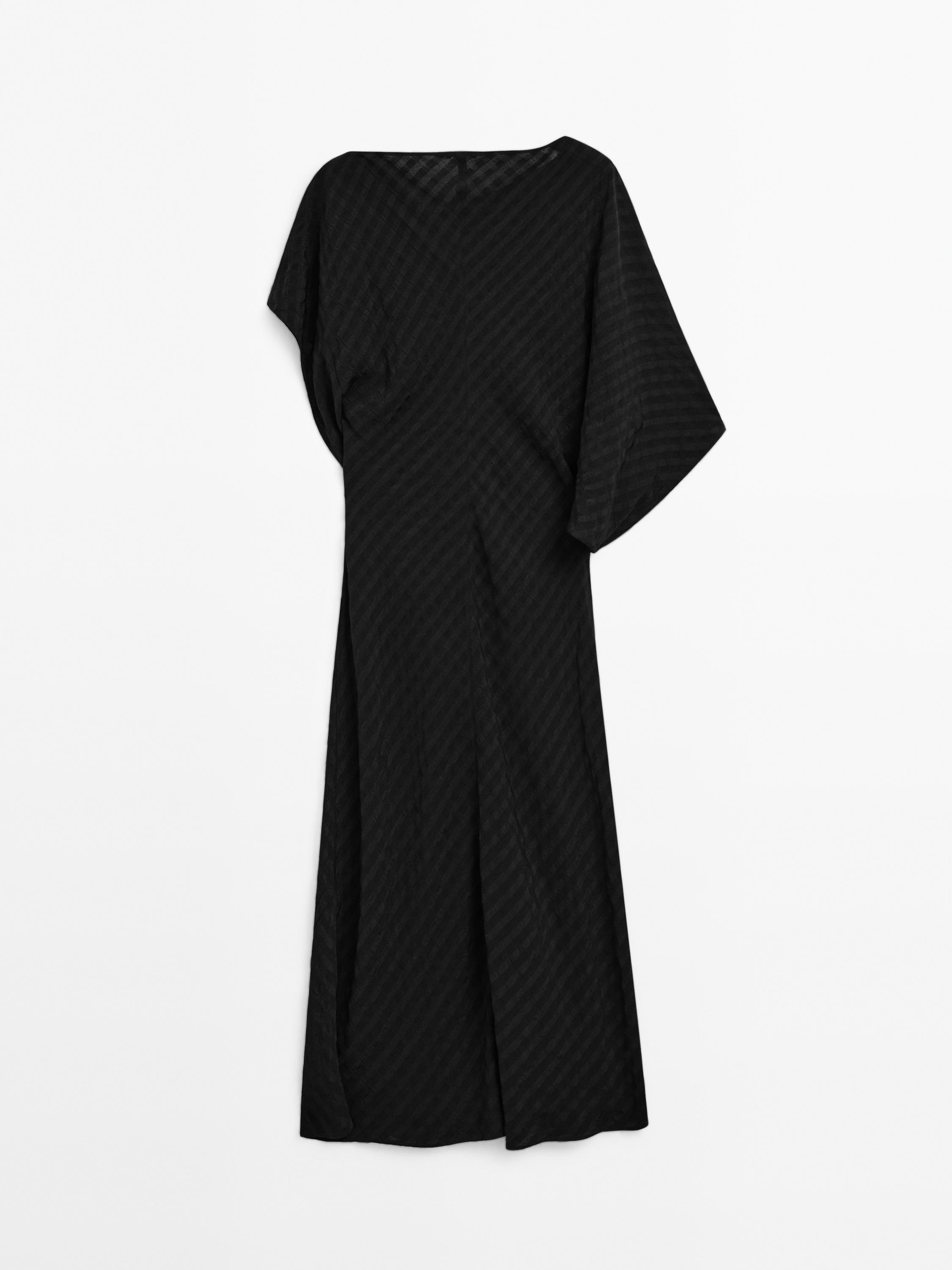 Long flowing dress with textured detail