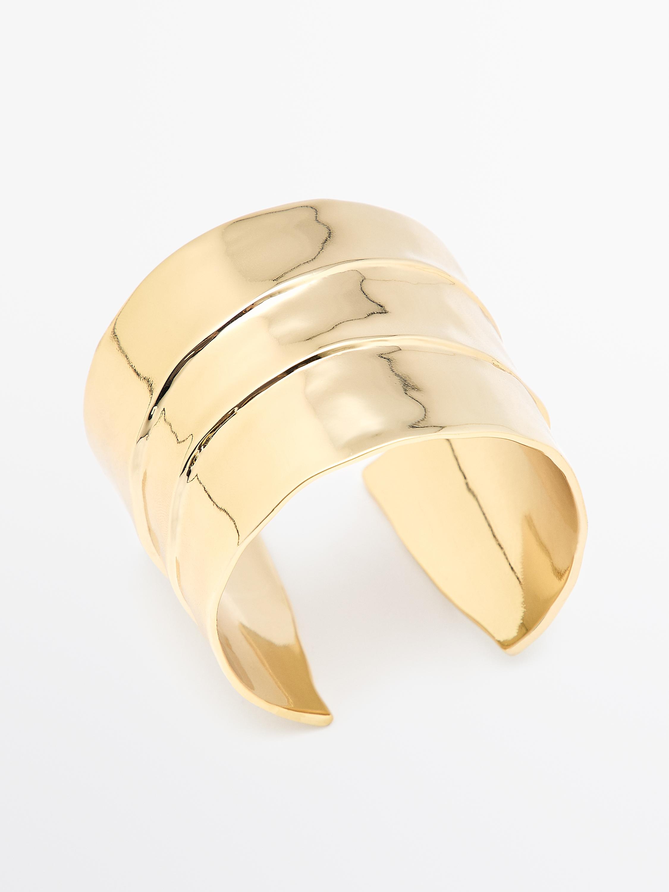 Brazalete metálico pliegue
