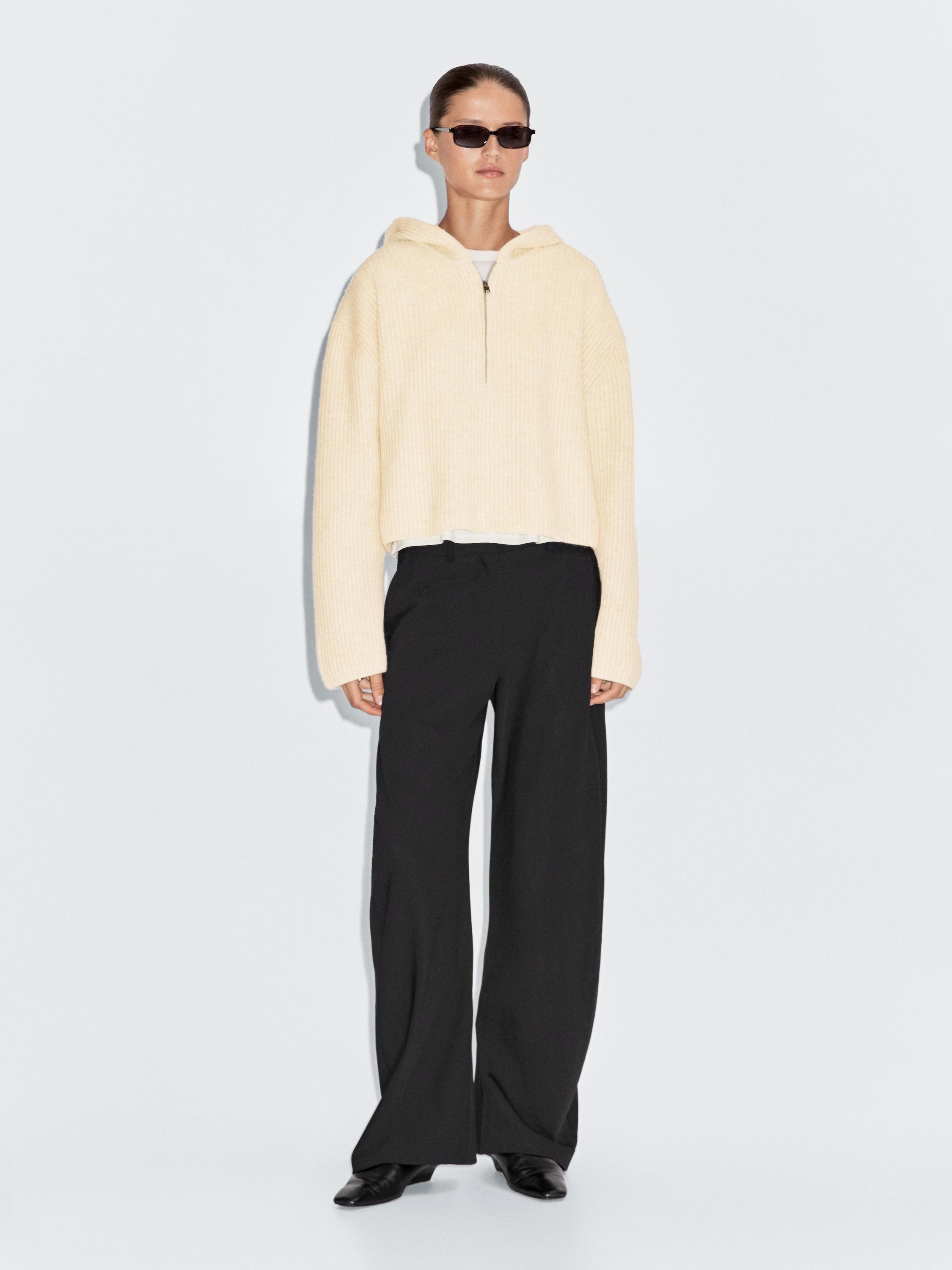 Wool blend sweater with hood detail