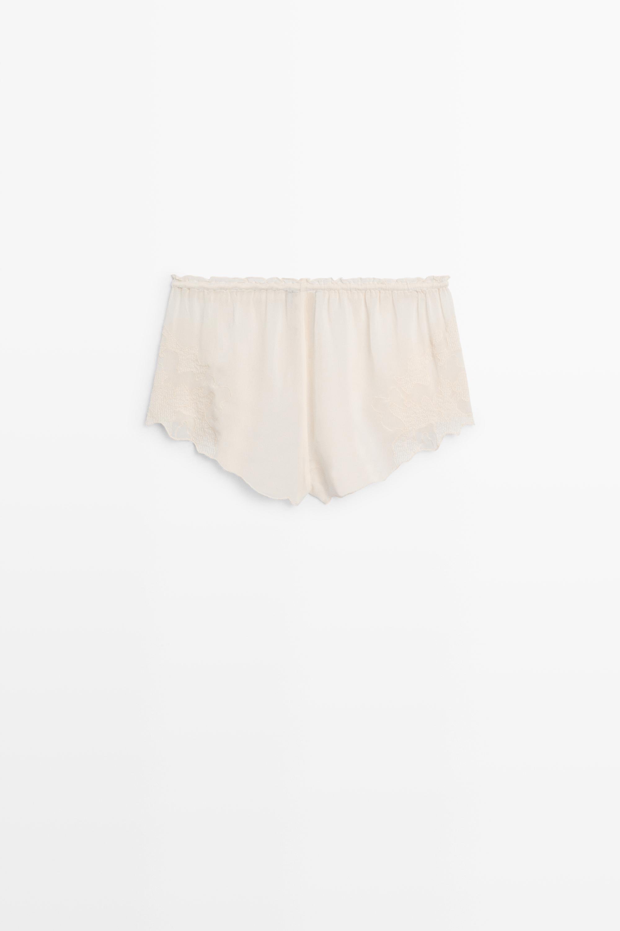 Flowing shorts with embroidered detail — CREAM