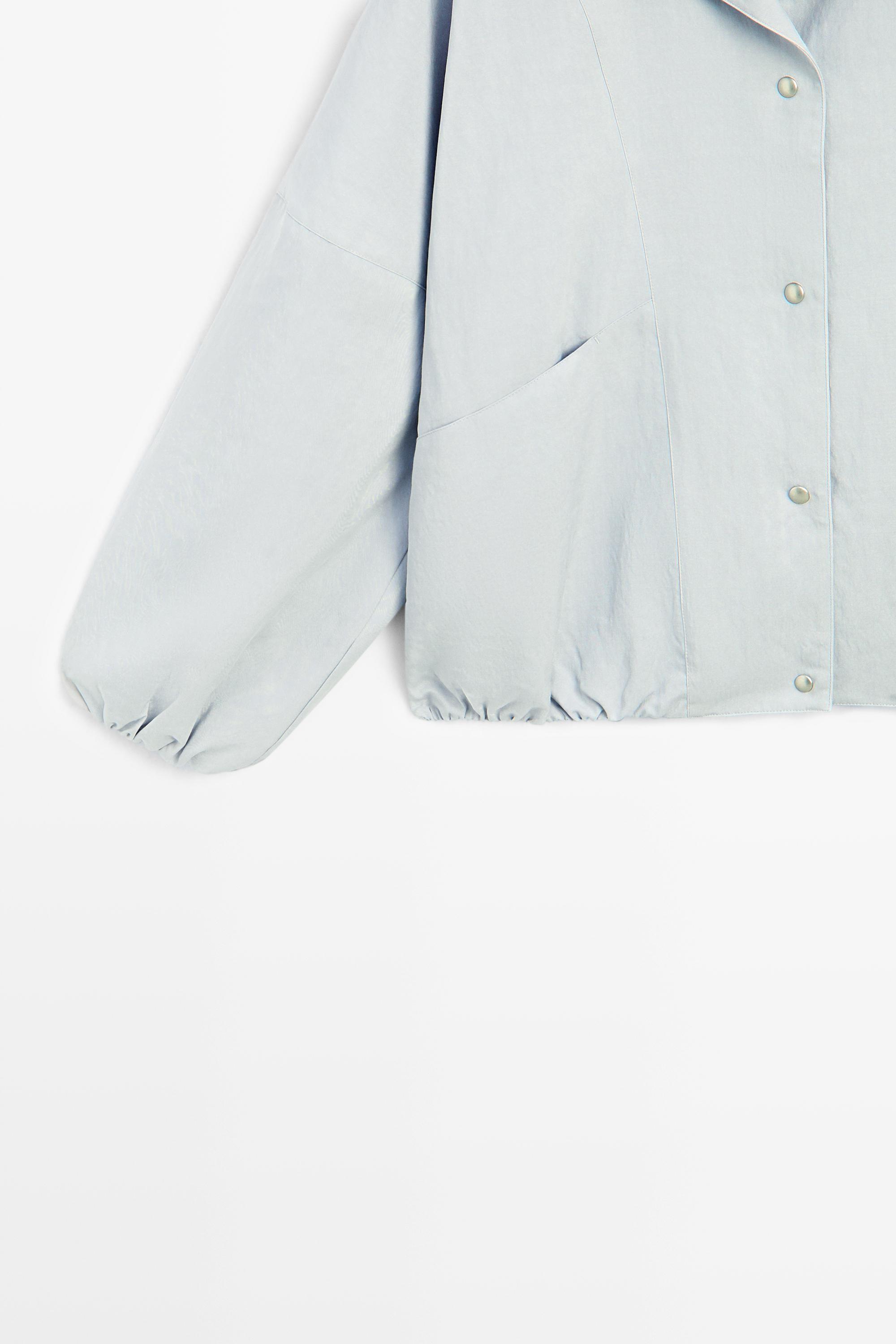 High collar bomber jacket with pocket details — Light blue