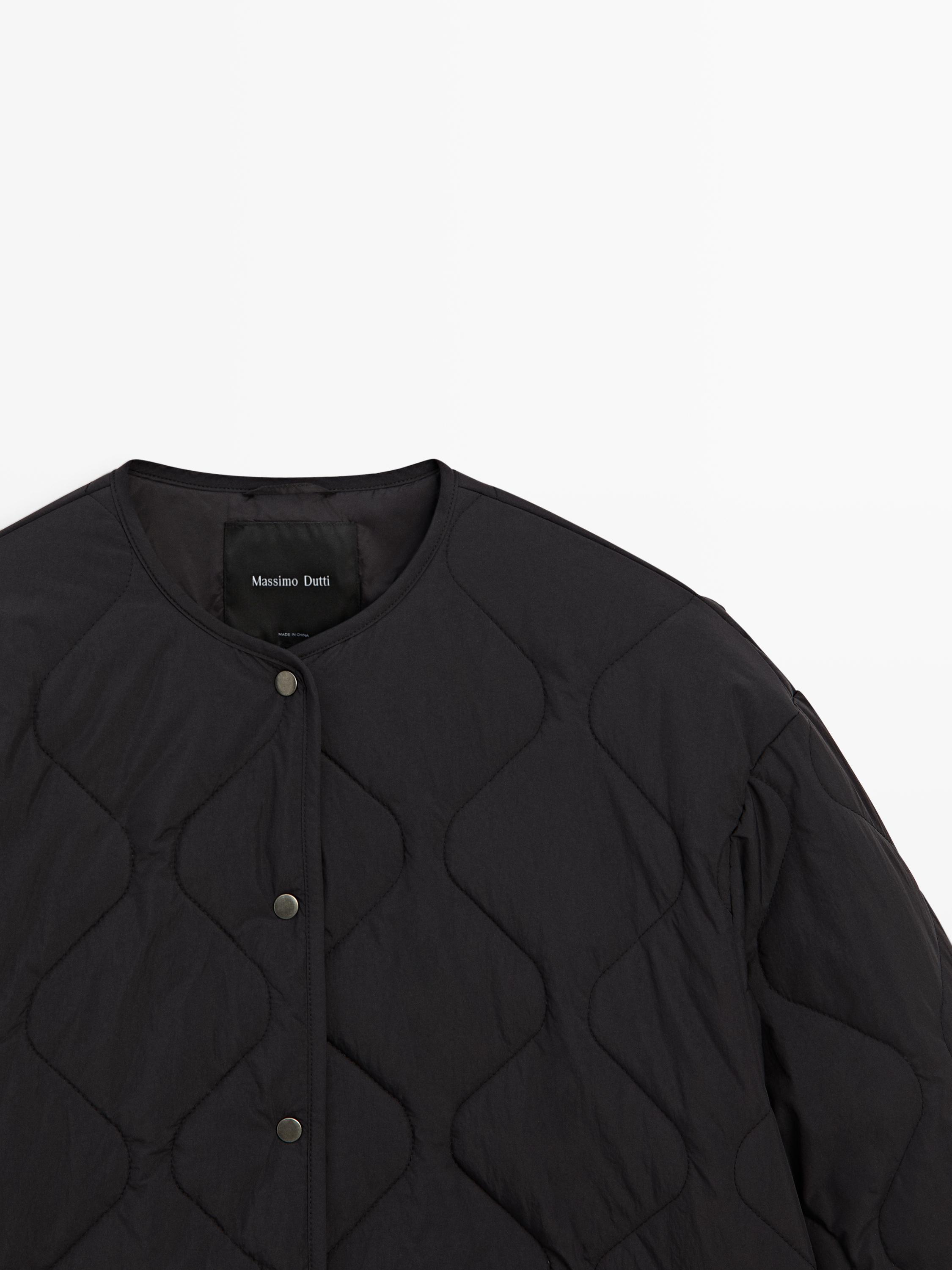 Quilted cape jacket — BLACK