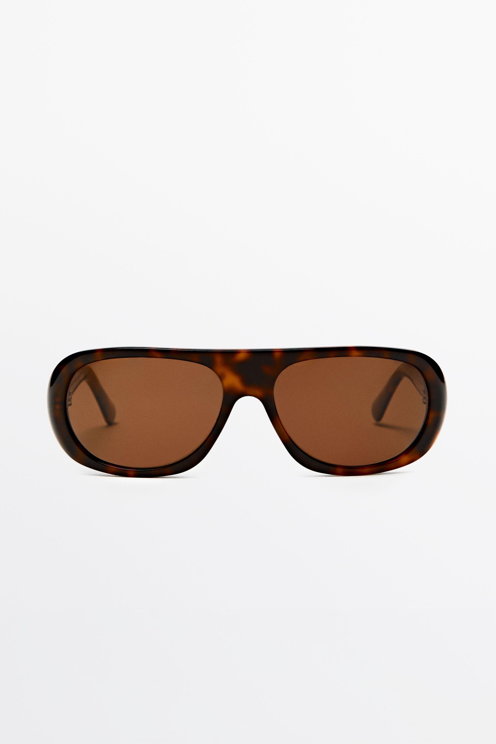 Oval tortoiseshell-effect sunglasses — BROWN