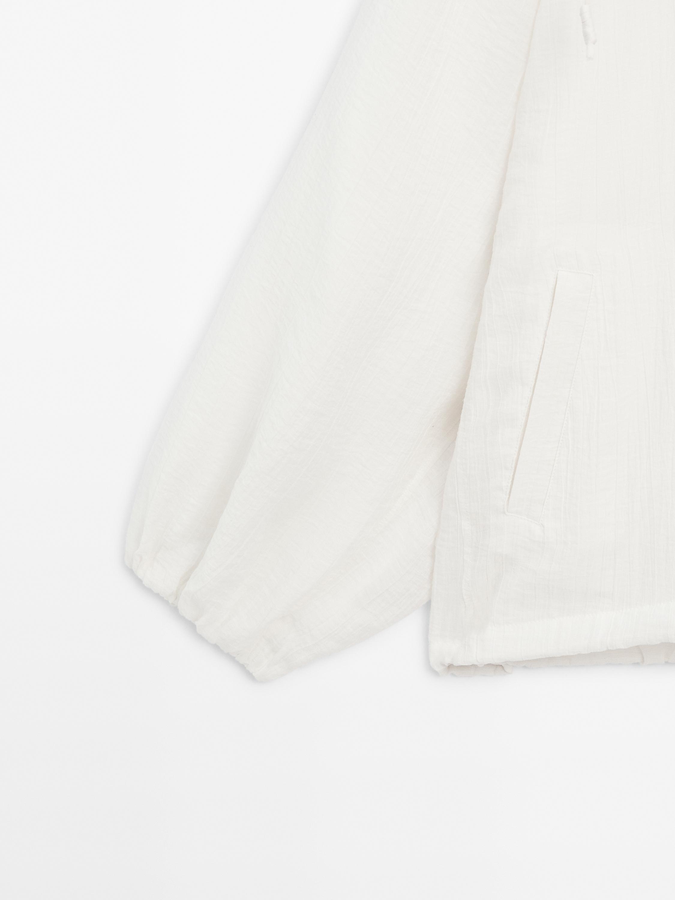 Flowing bomber jacket with voluminous detail