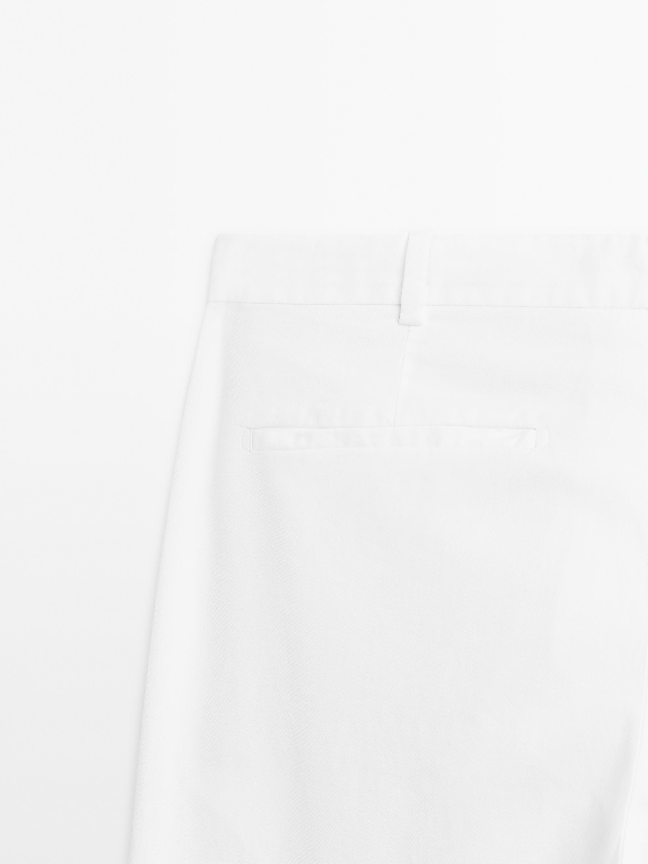 Slim fit панталони