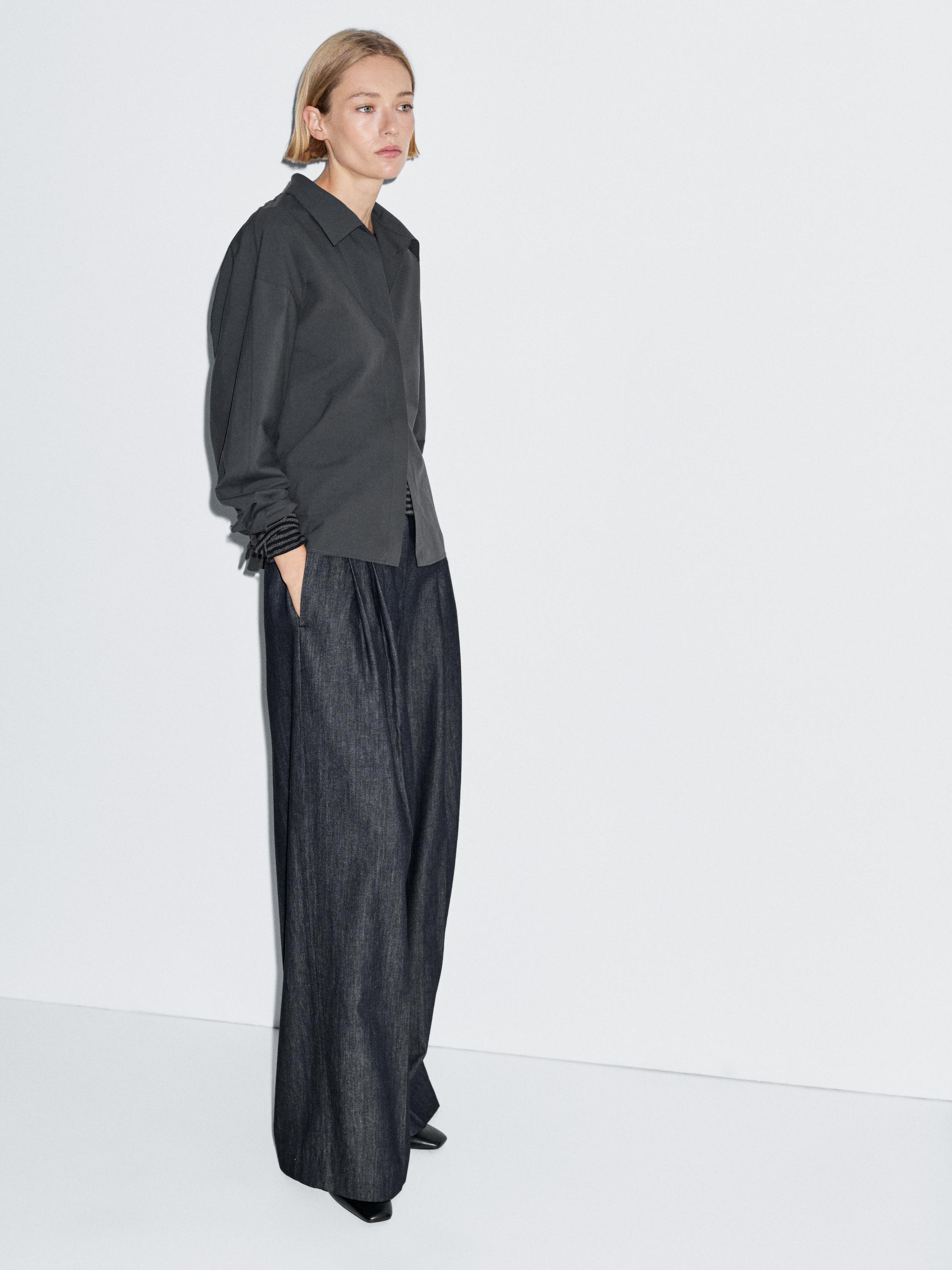 Kõrge vöökoha ja laia wide-leg säärega kerged teksad