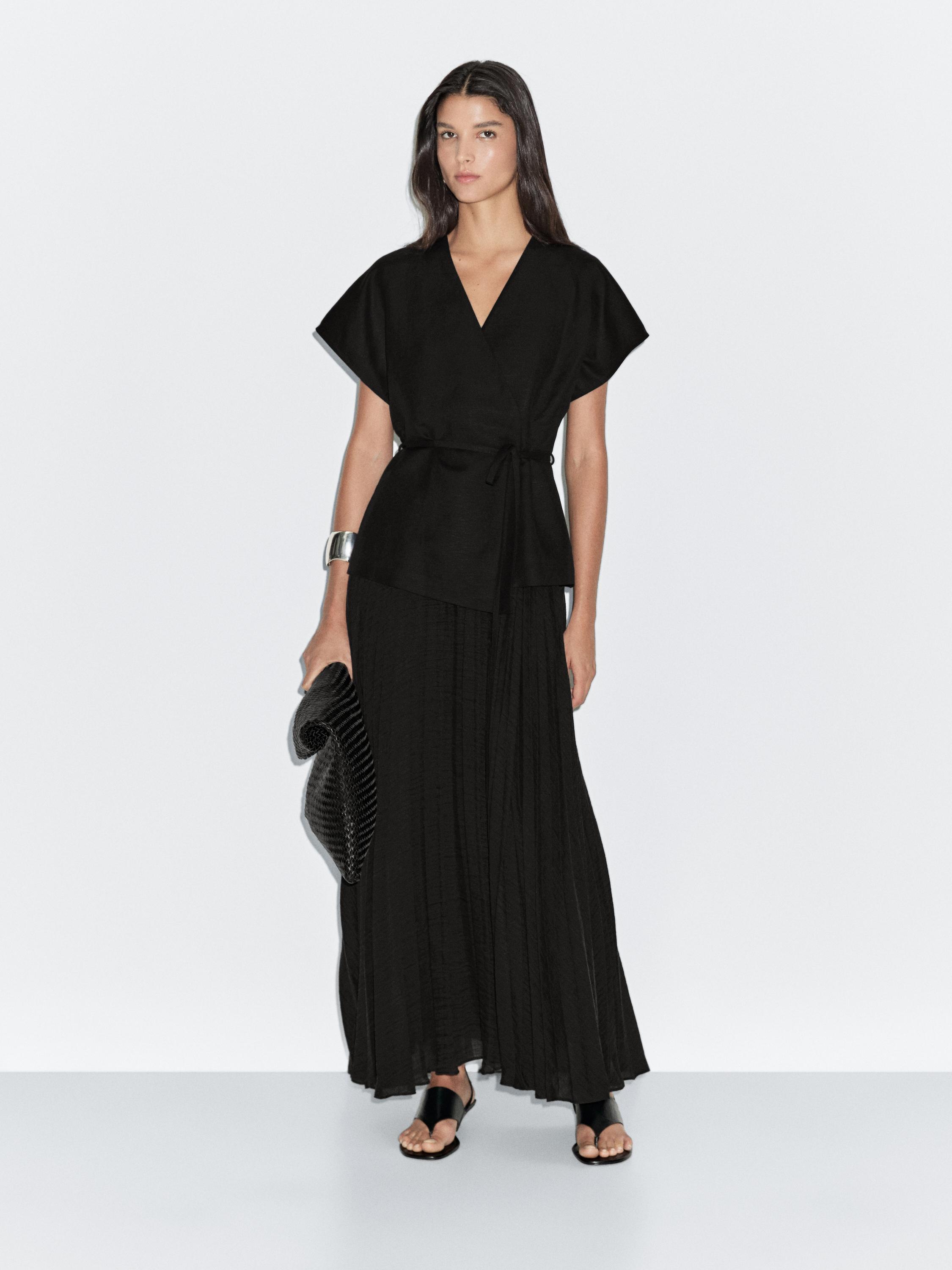Long pleated dress with waistcoat detail