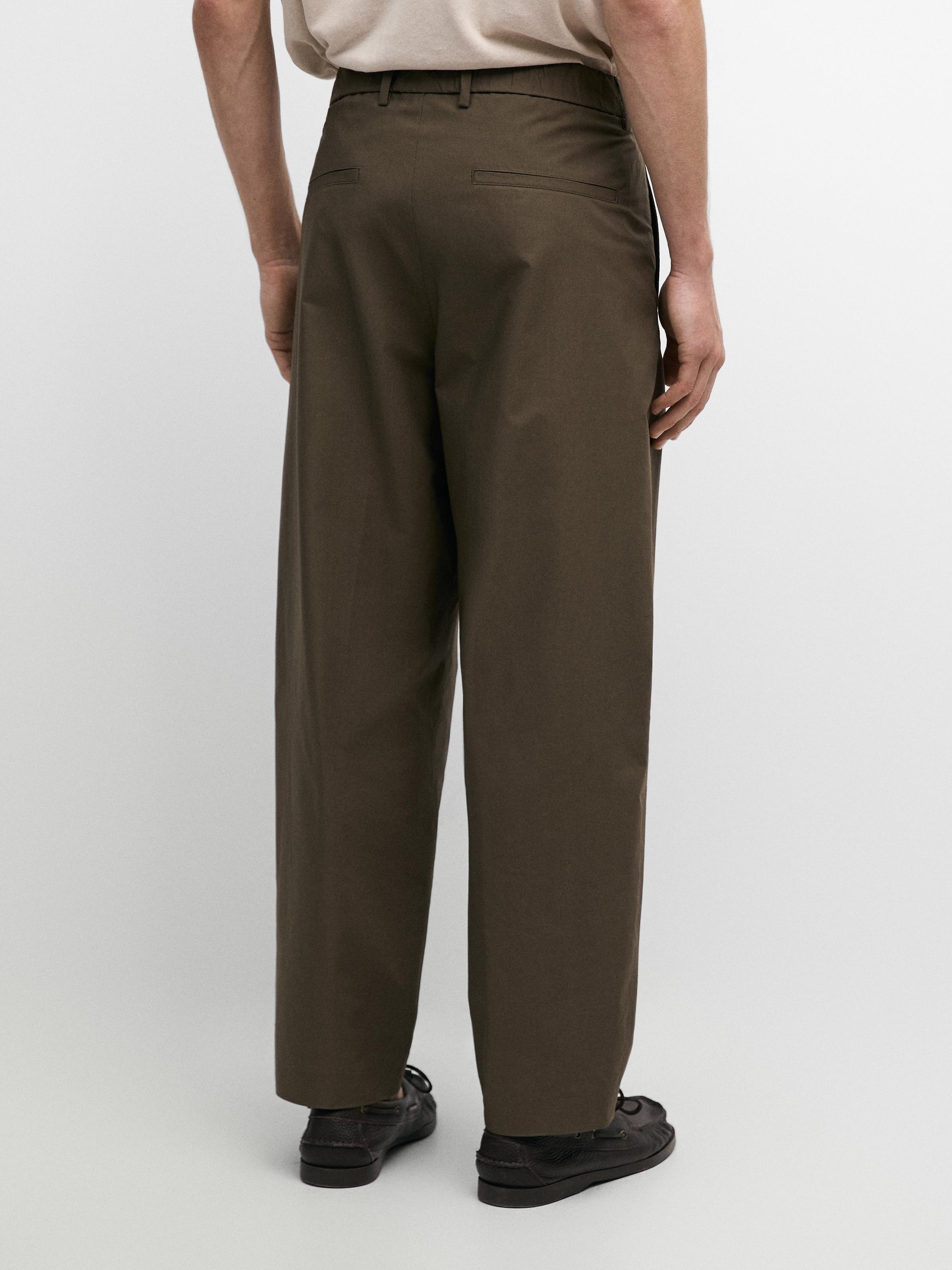 Cotton trousers with double darts — DARK GREEN