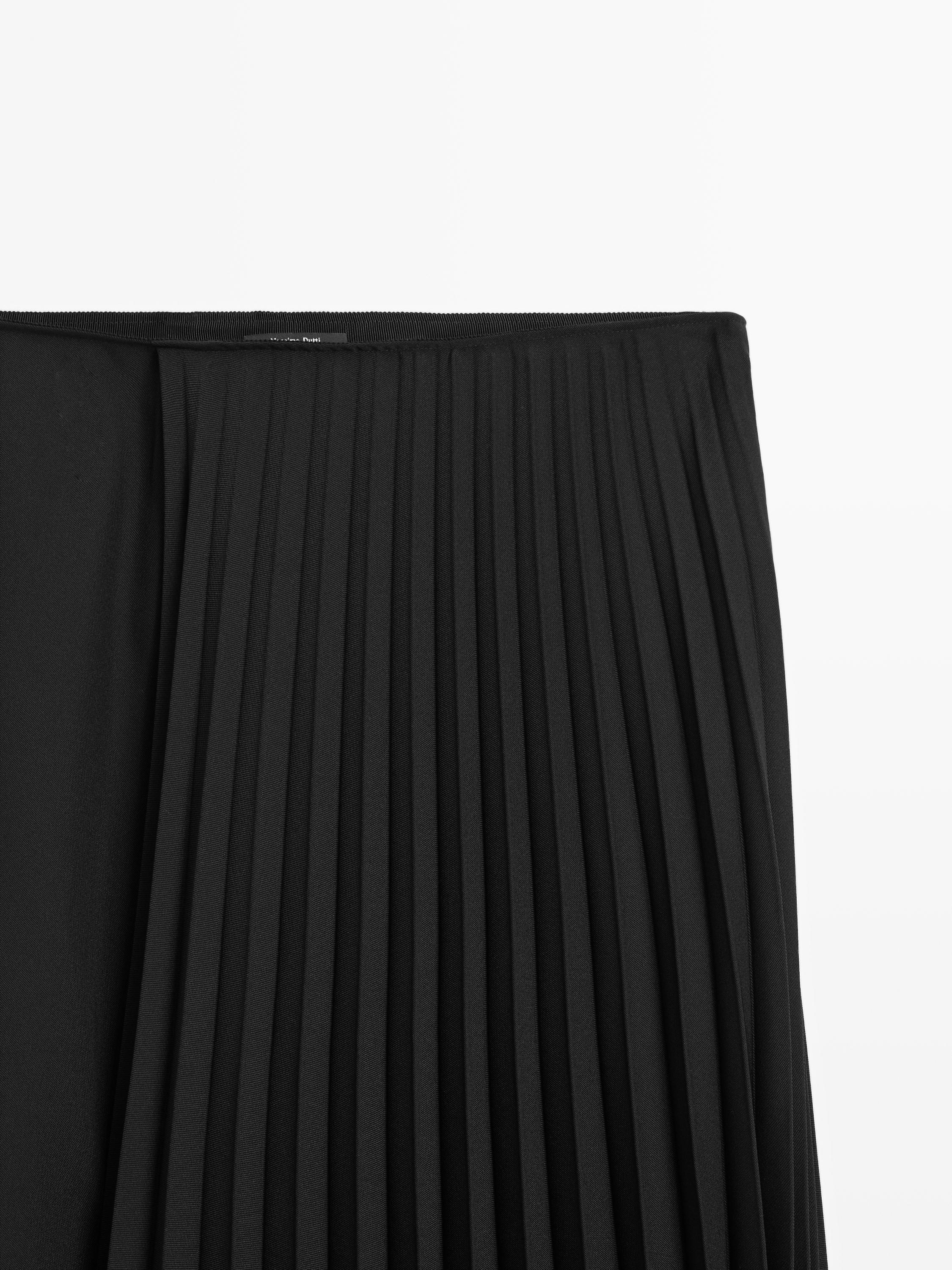 Asymmetric box pleat skirt