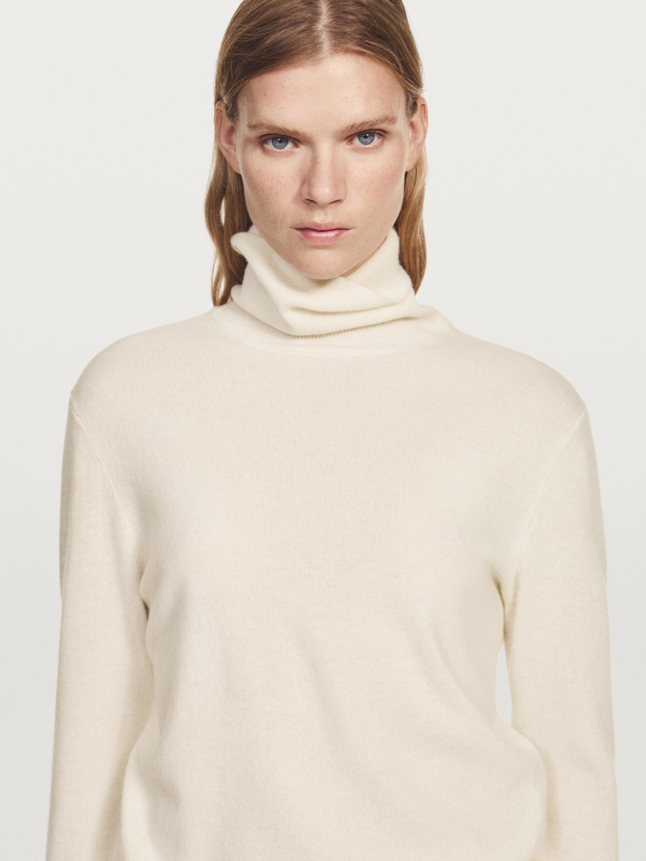 Wool blend knit sweater with high neck
