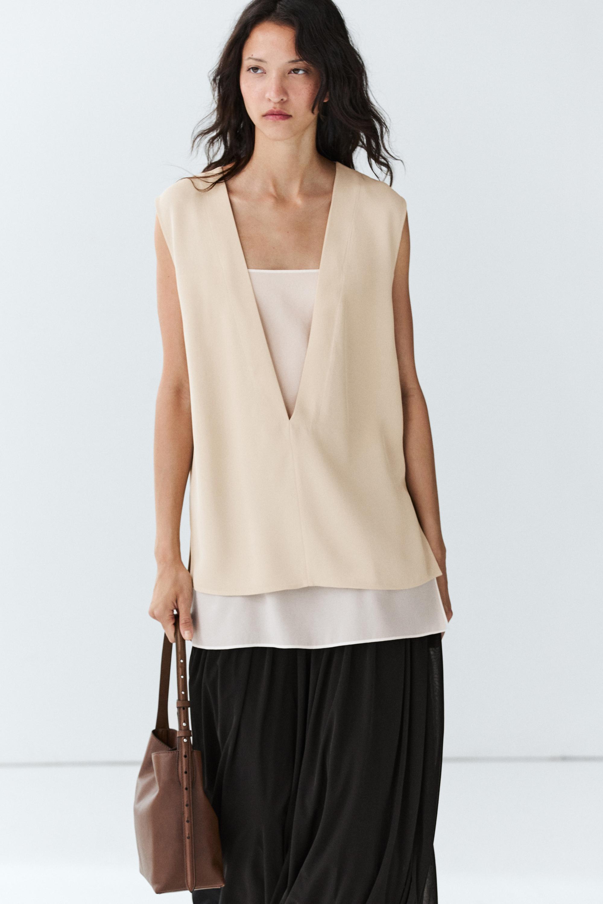 Flowing double-layer top with contrast detail — CREAM