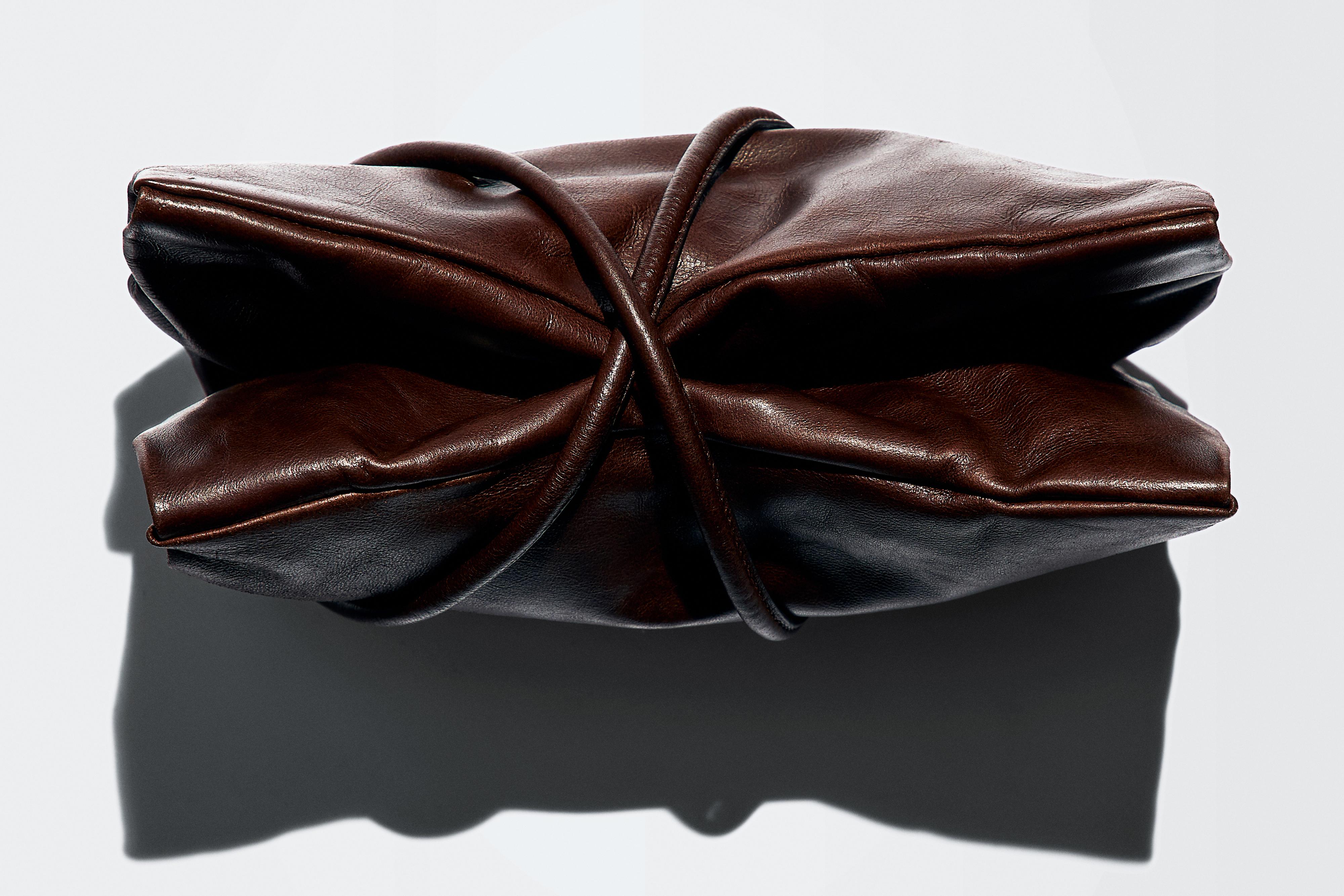Small nappa leather bag with compartments