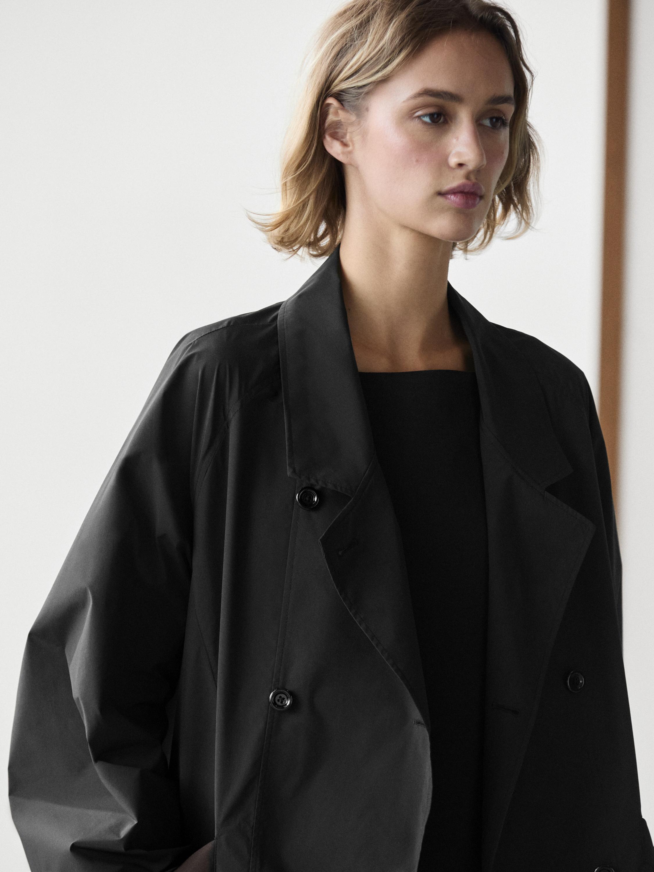 Double-breasted technical trench coat