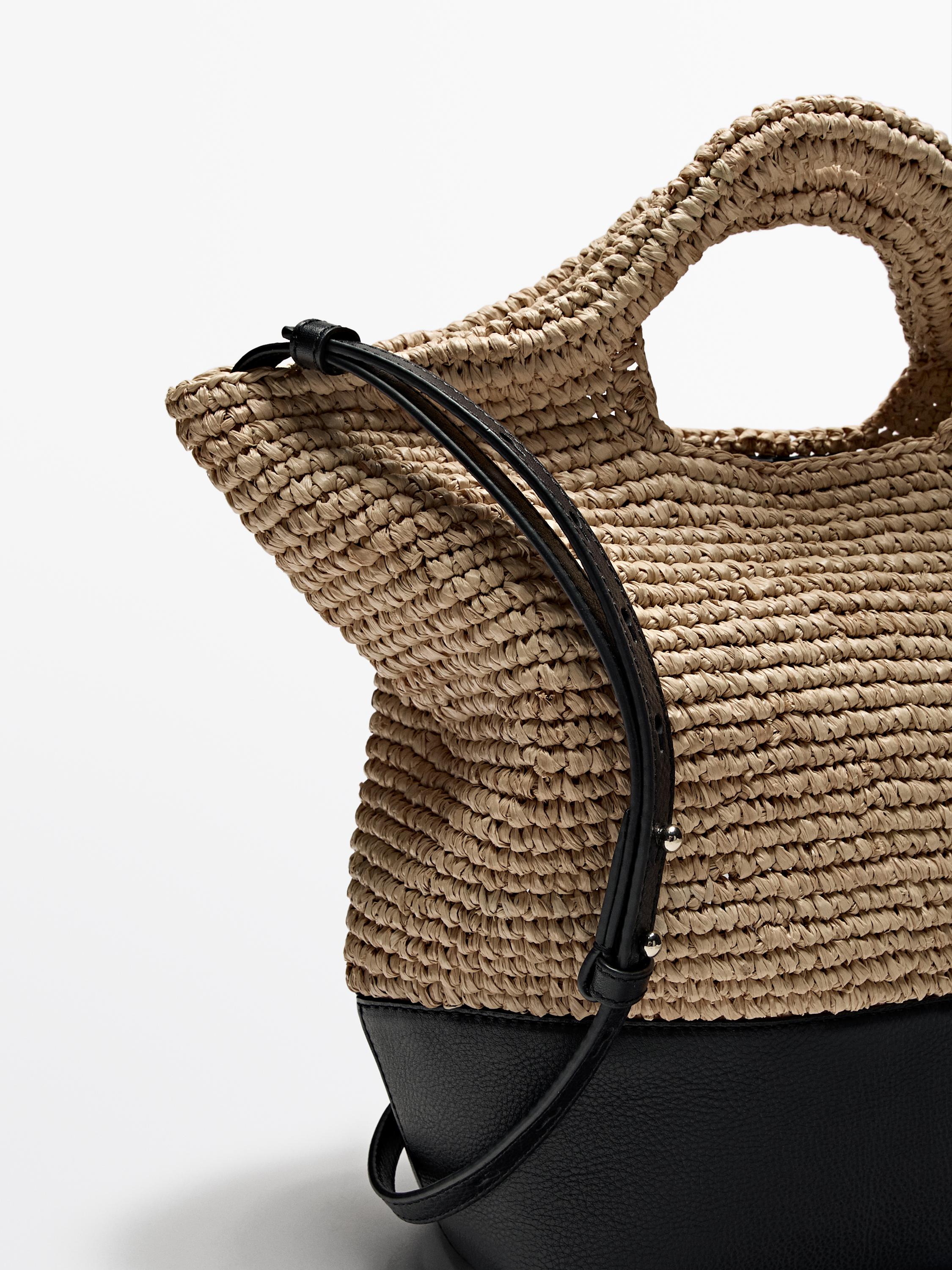 Natural raffia bag with leather base