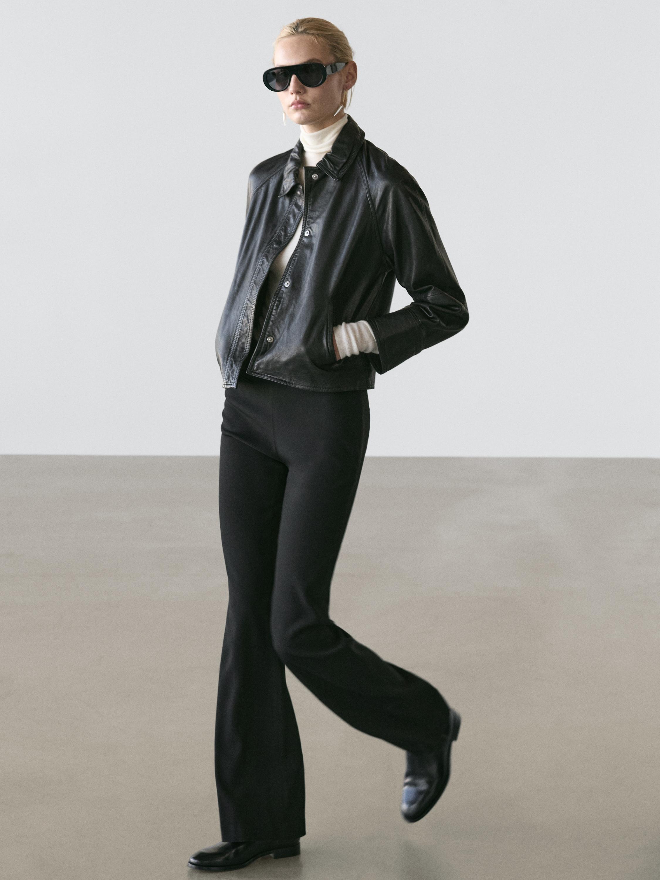 Flared trousers with pocket — BLACK