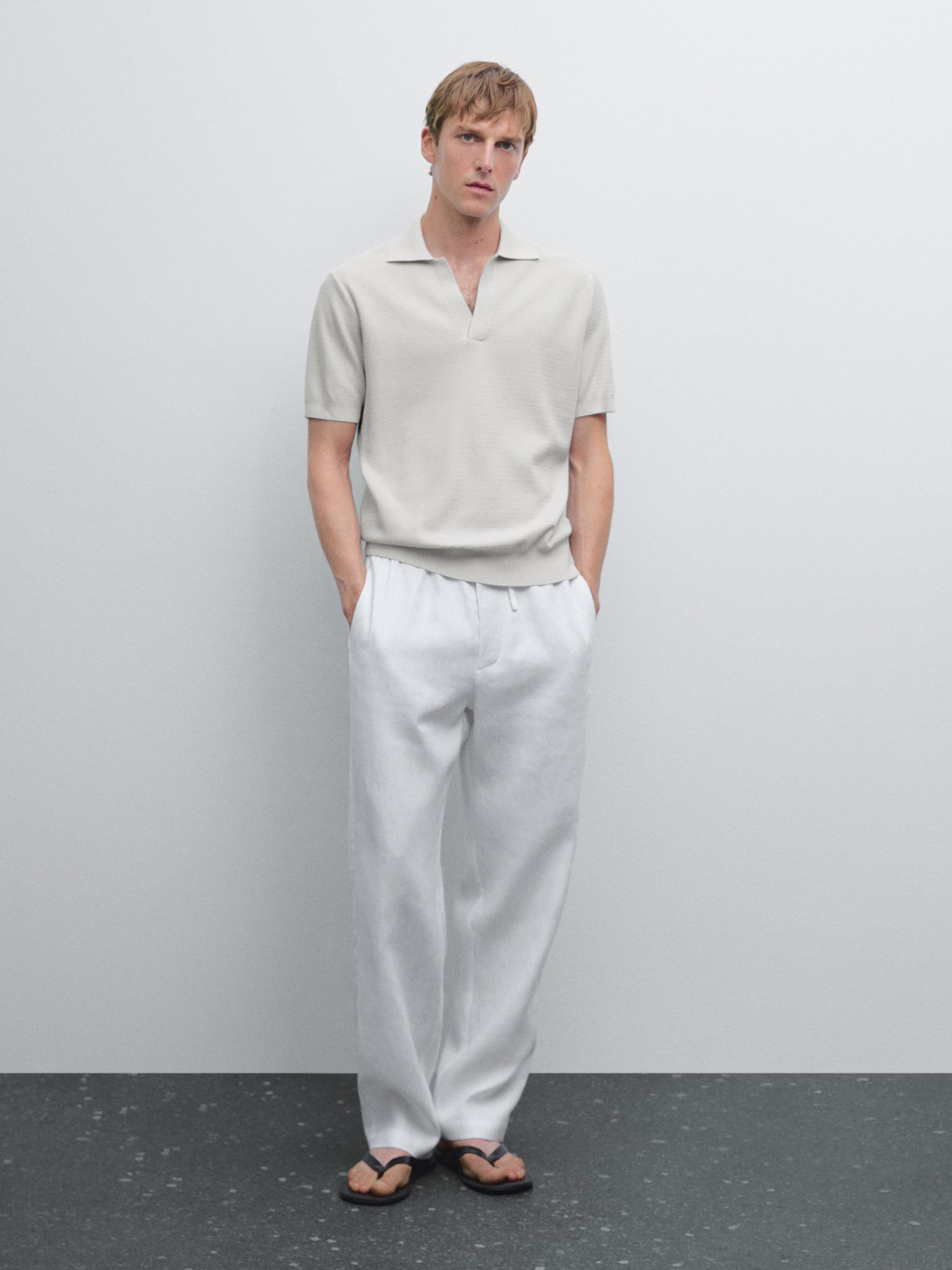 قميص بولو محاك بفتحة صدر على شكل V