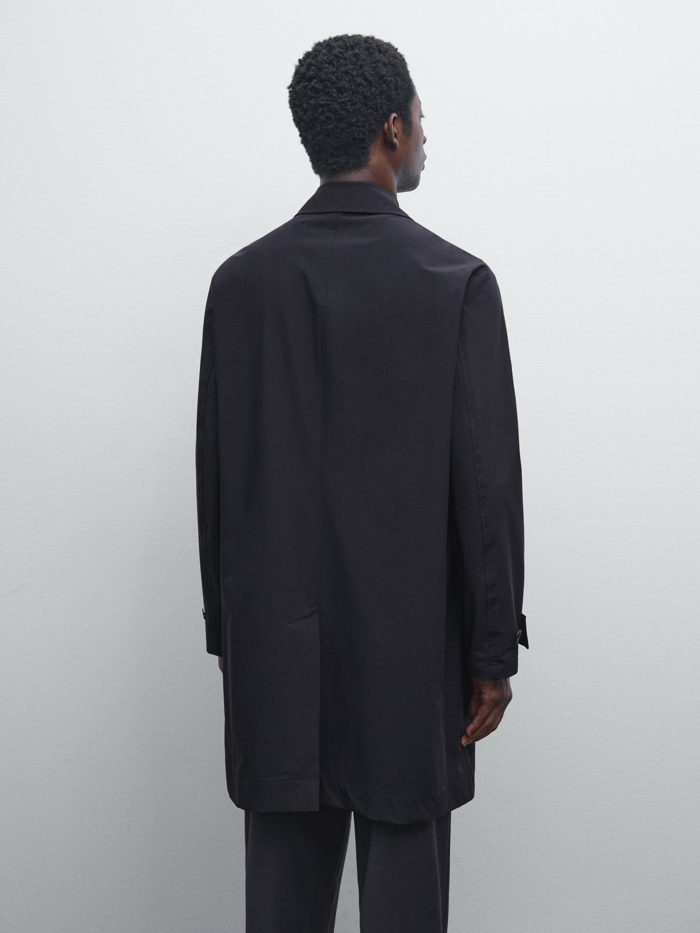 Lightweight trench coat with hidden buttons