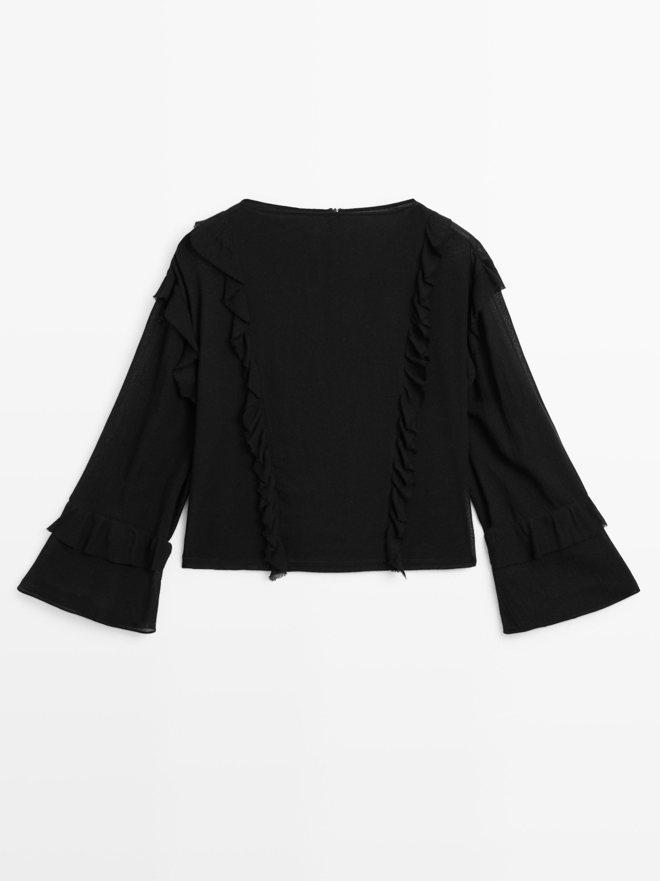 Blusa fluida volantes cremallera