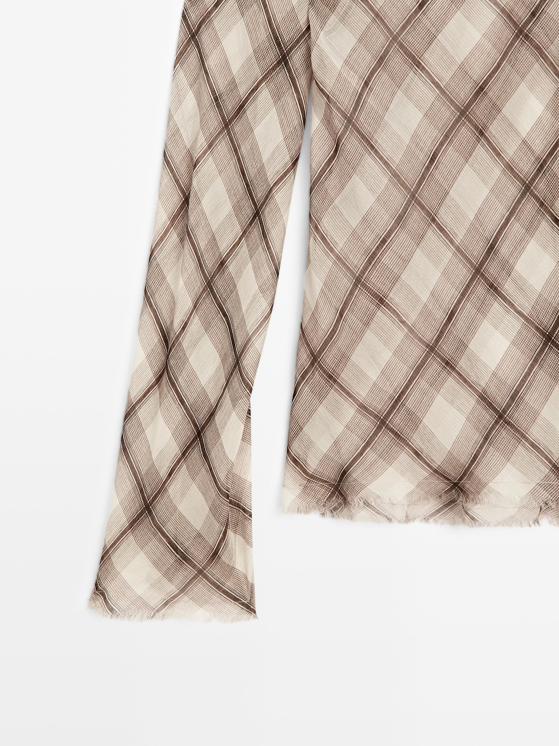 Check shirt with frayed trims