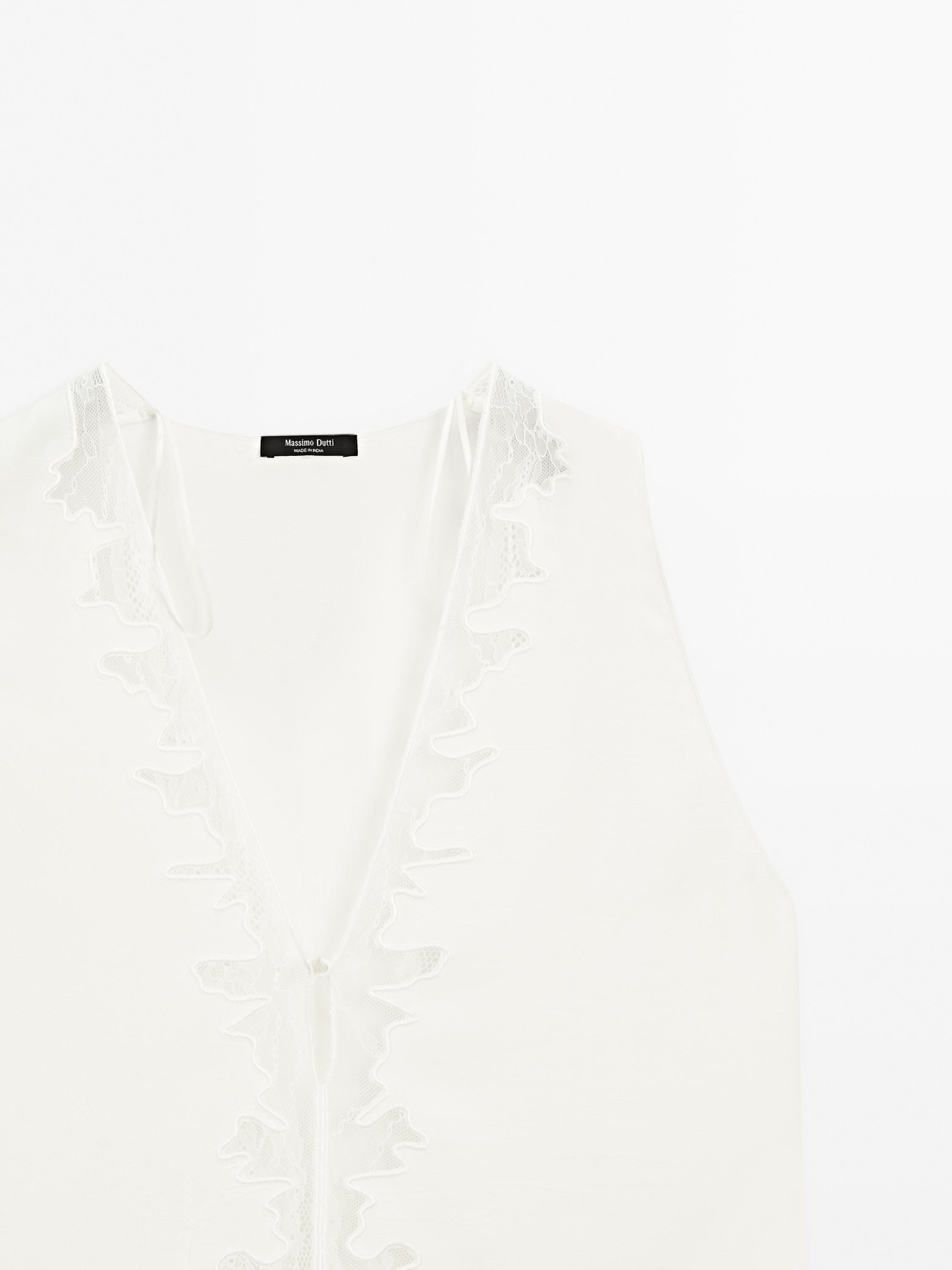 Flowing blouse with lace detail