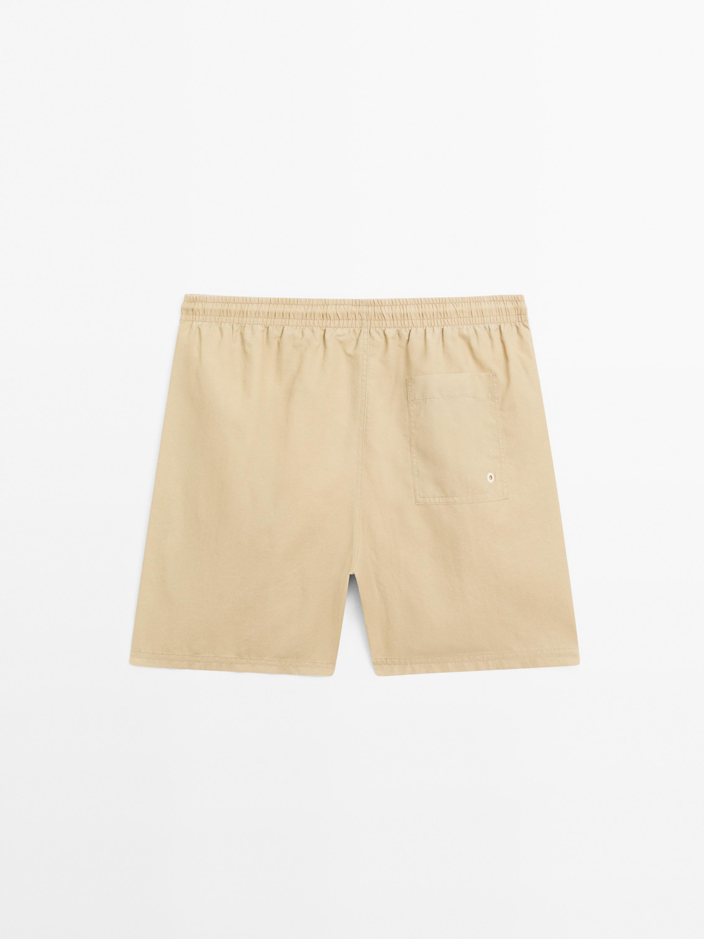 Plain regular fit swimming trunks