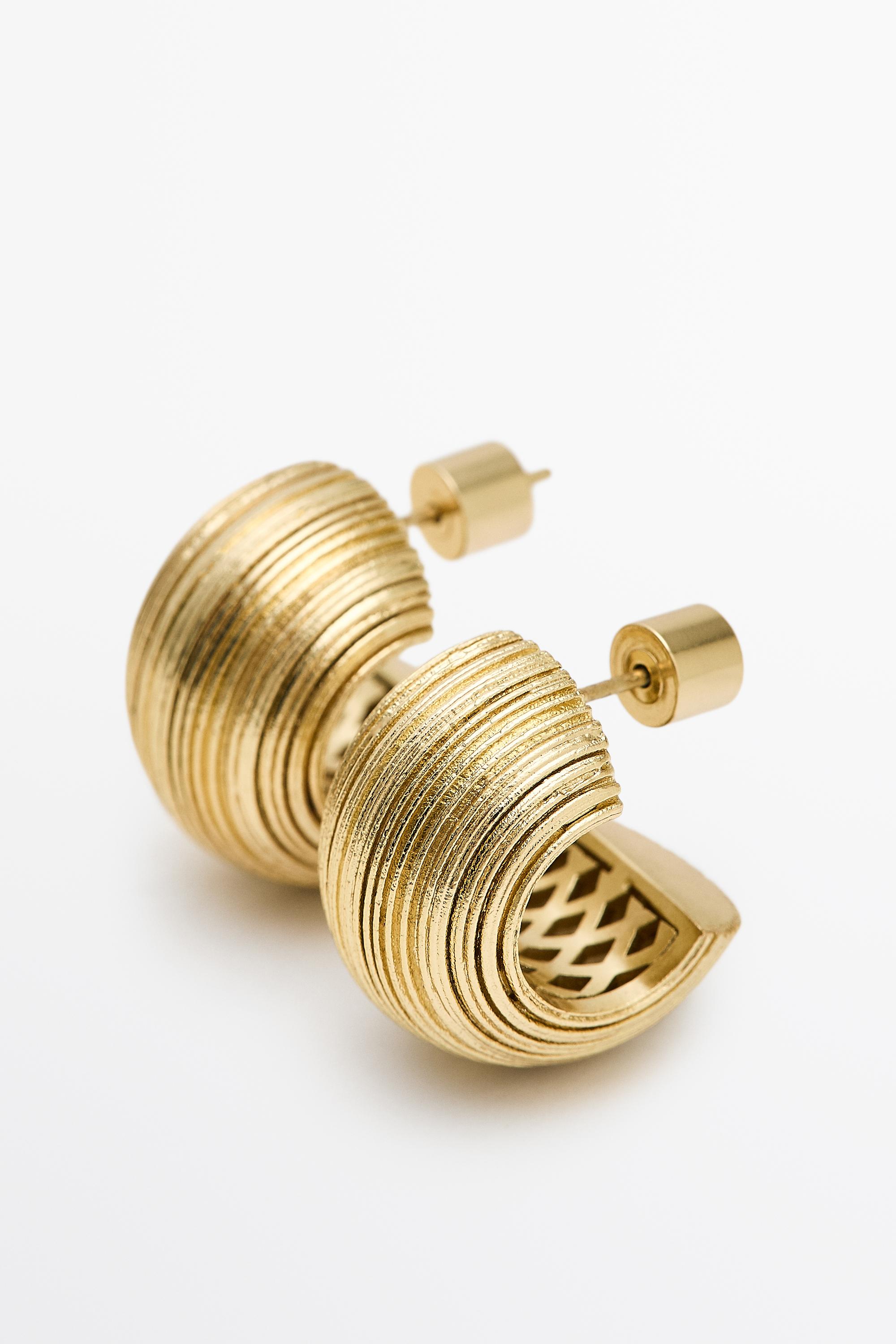 Raised design hoop earrings — GOLDEN