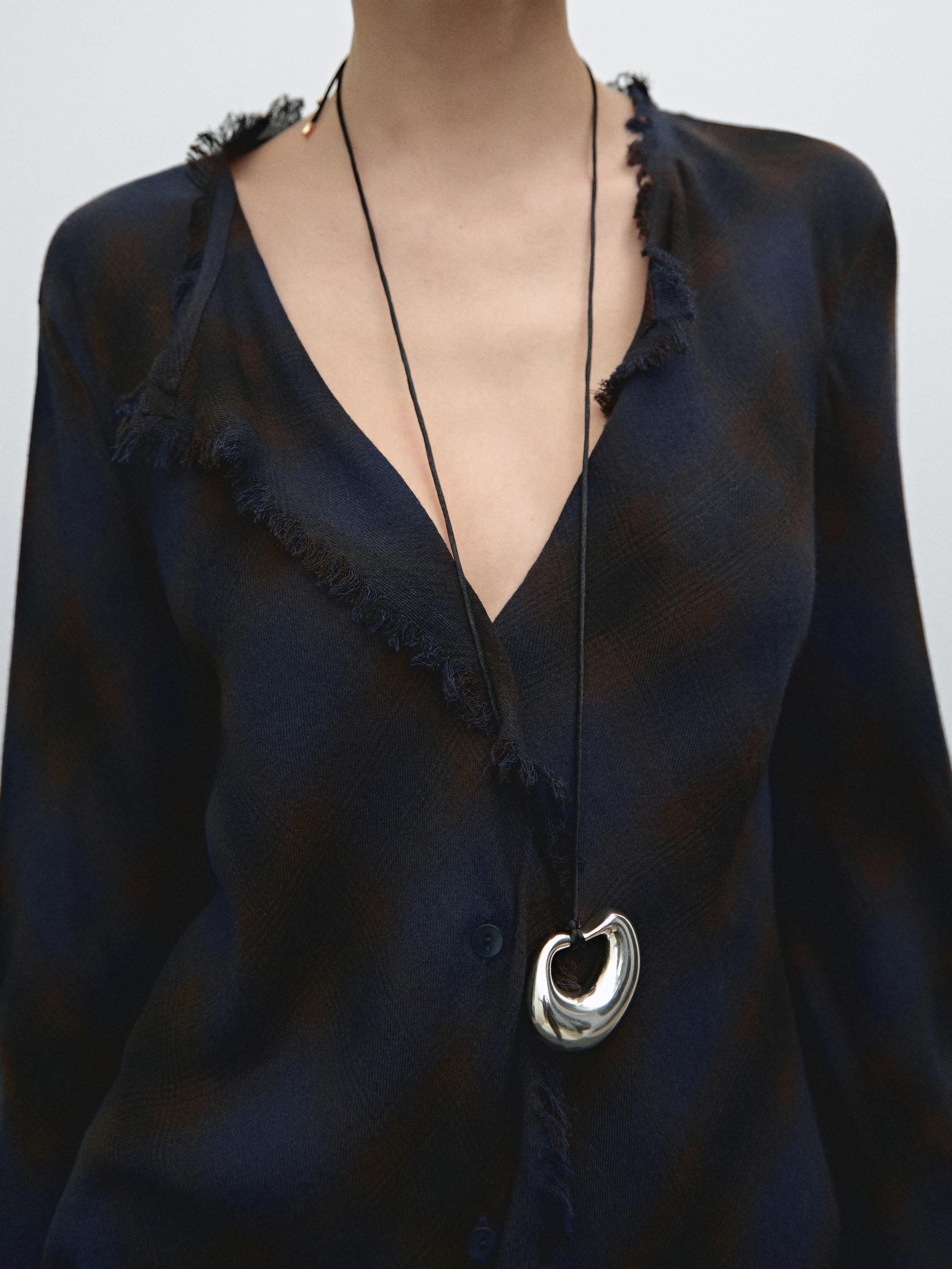 Check shirt with frayed edge detail