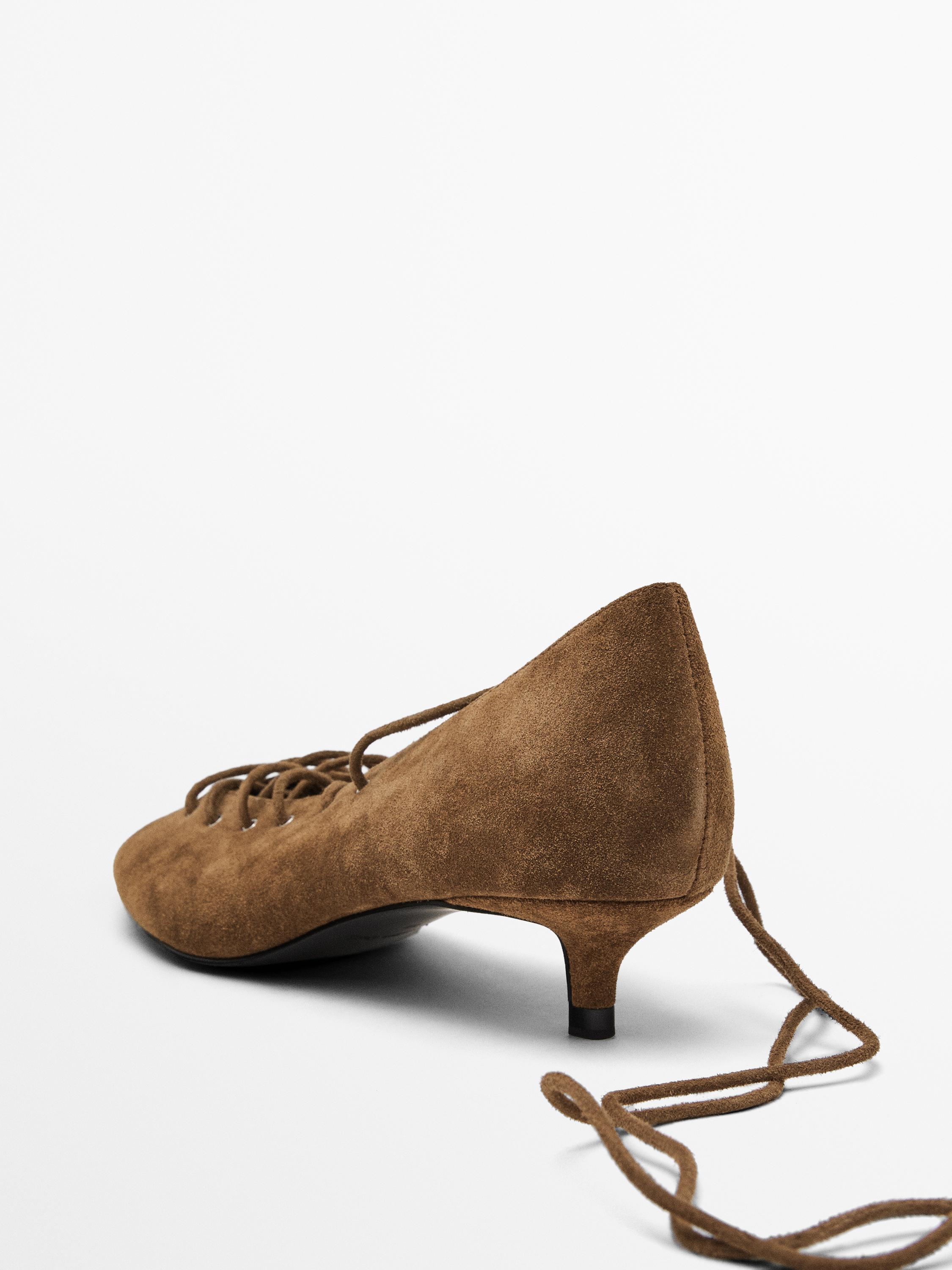 Lace-up high heel shoes