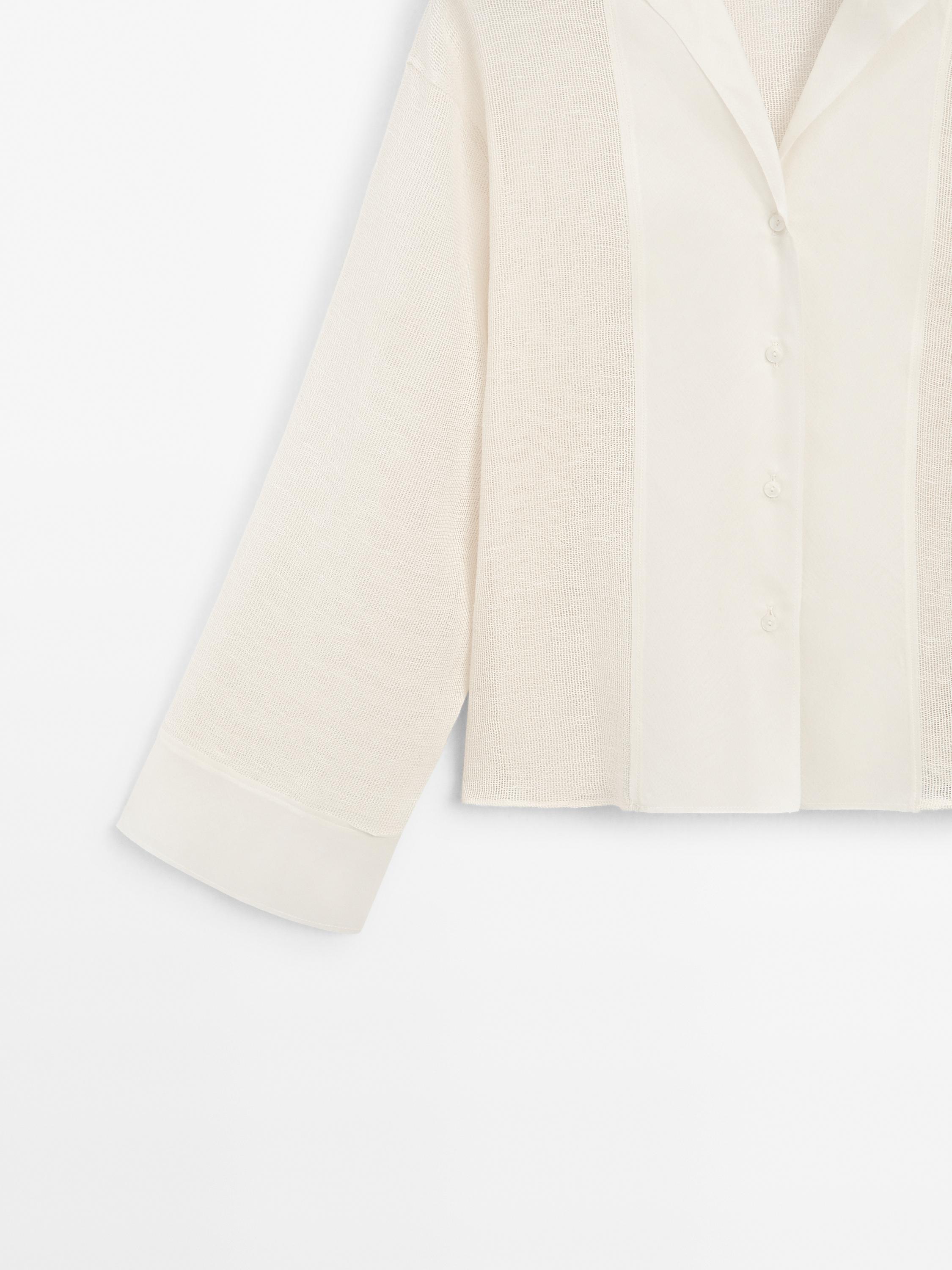 Cotton blend blouse with fabric detail