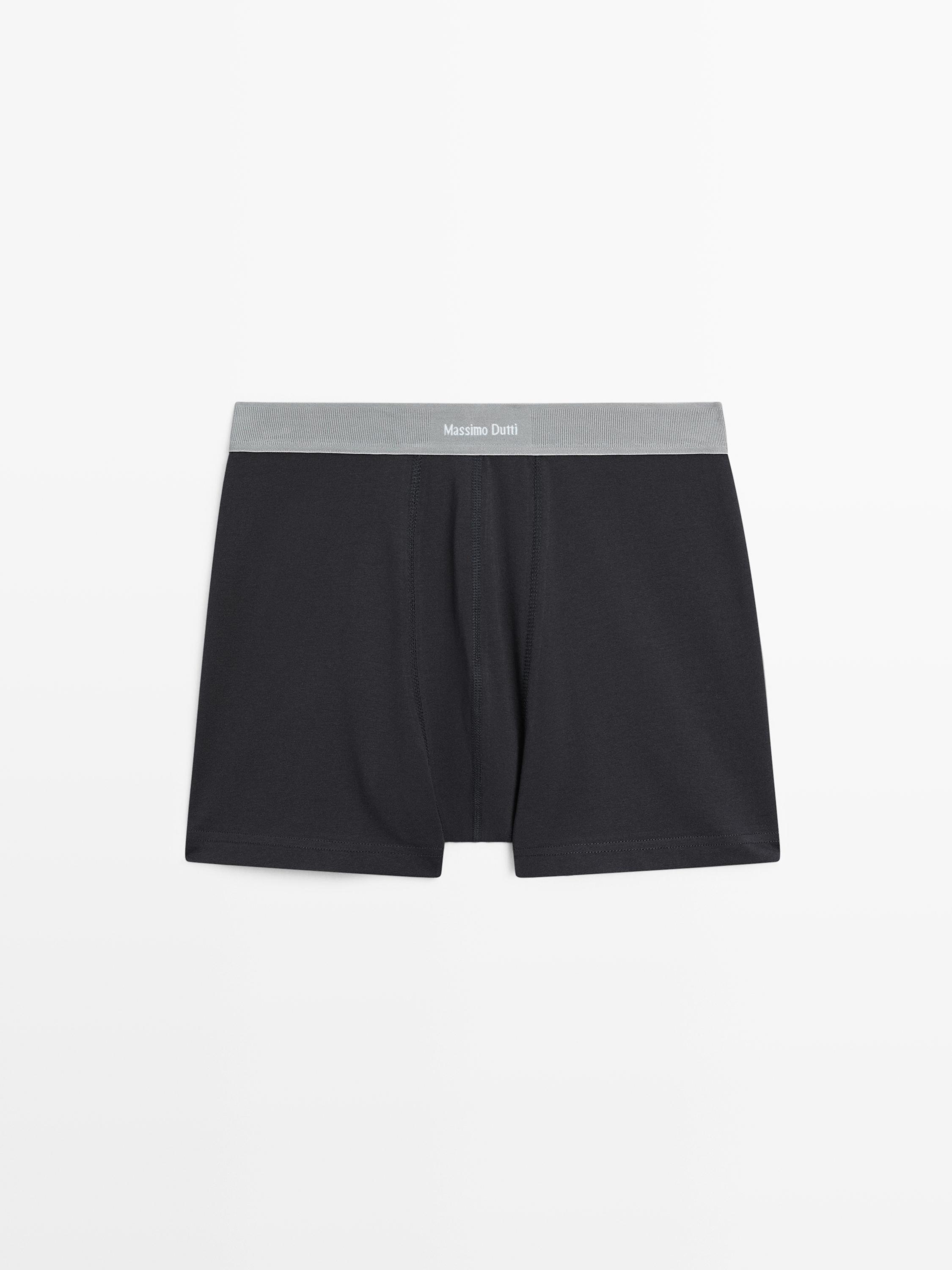 Трусы-боксеры с логотипом на поясе