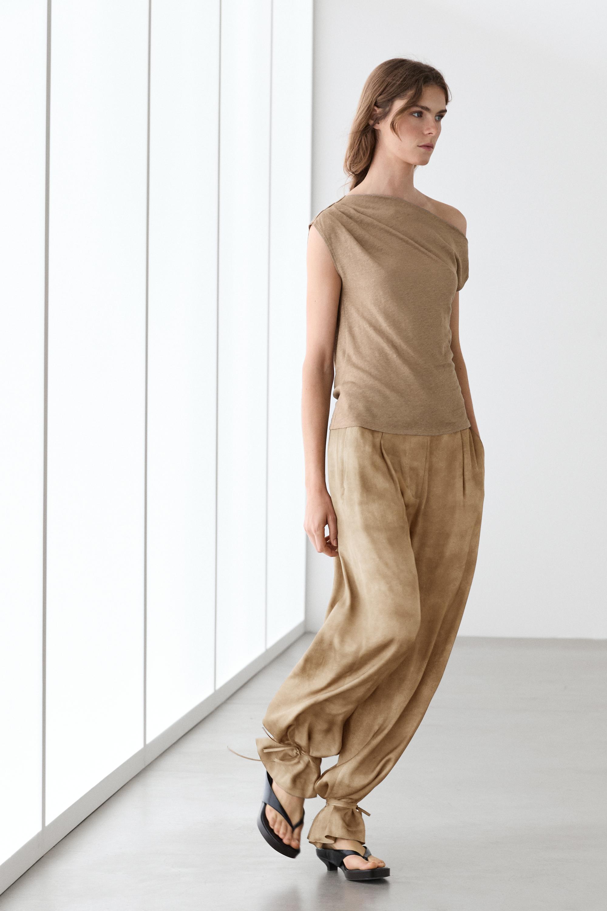 Asymmetric linen blend top with draped detail — Washed