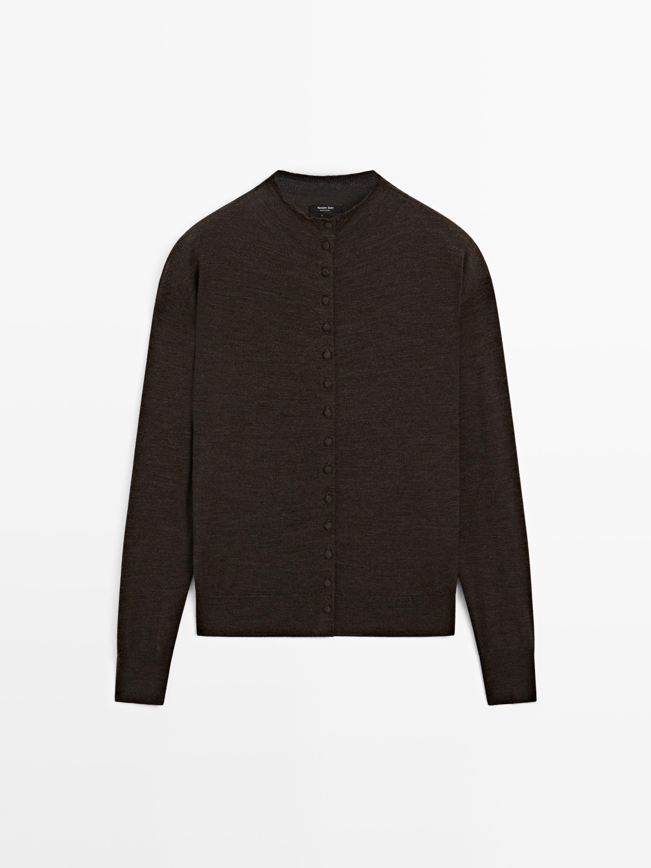 Mock turtleneck cardigan with covered buttons