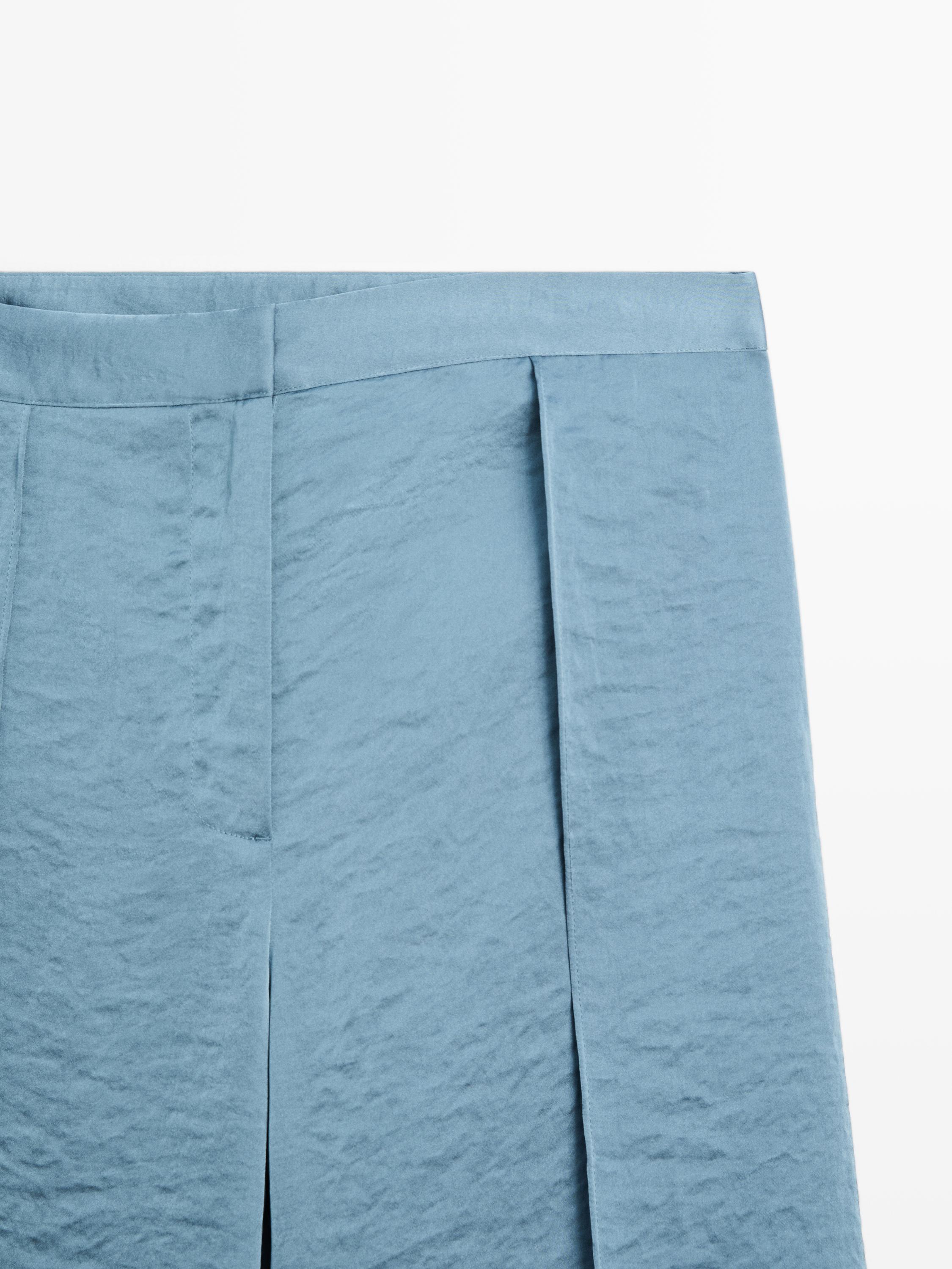 Flowing palazzo trousers with slits