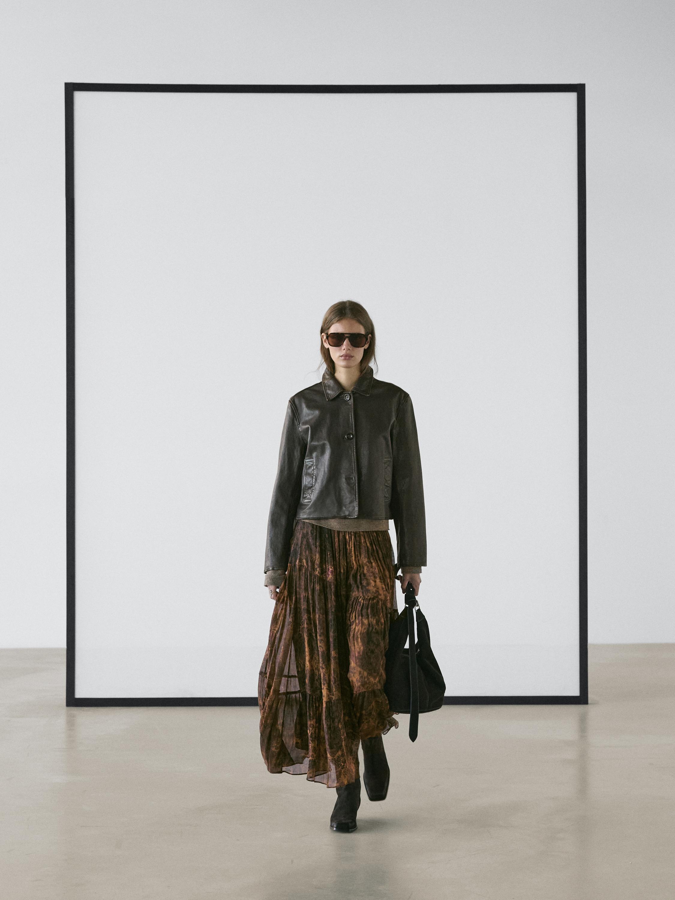 Flowing asymmetric midi skirt