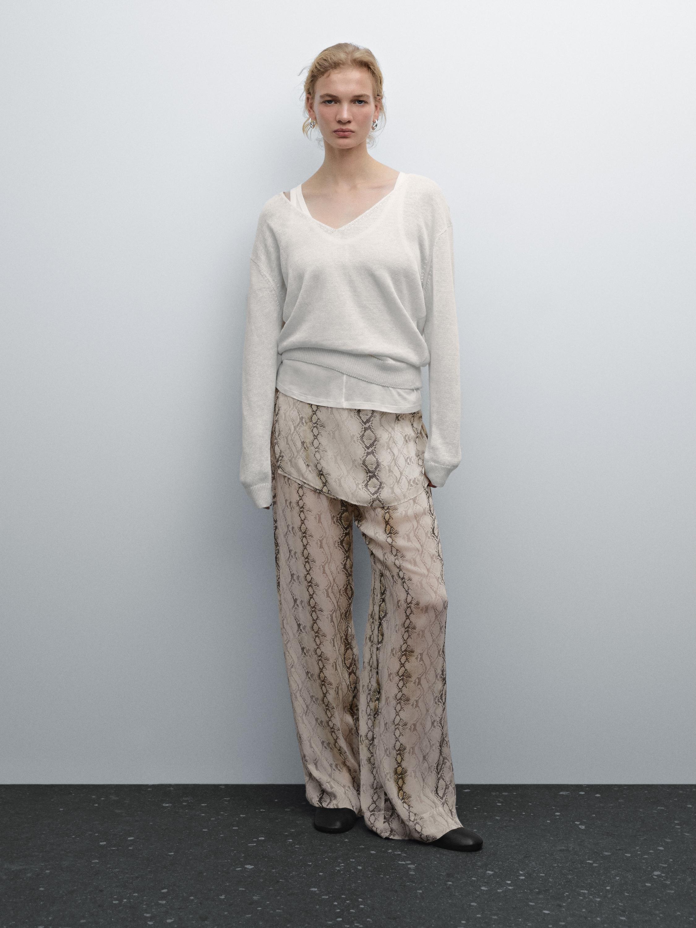 سويتر محاك كتان 100% بفتحة صدر على شكل V