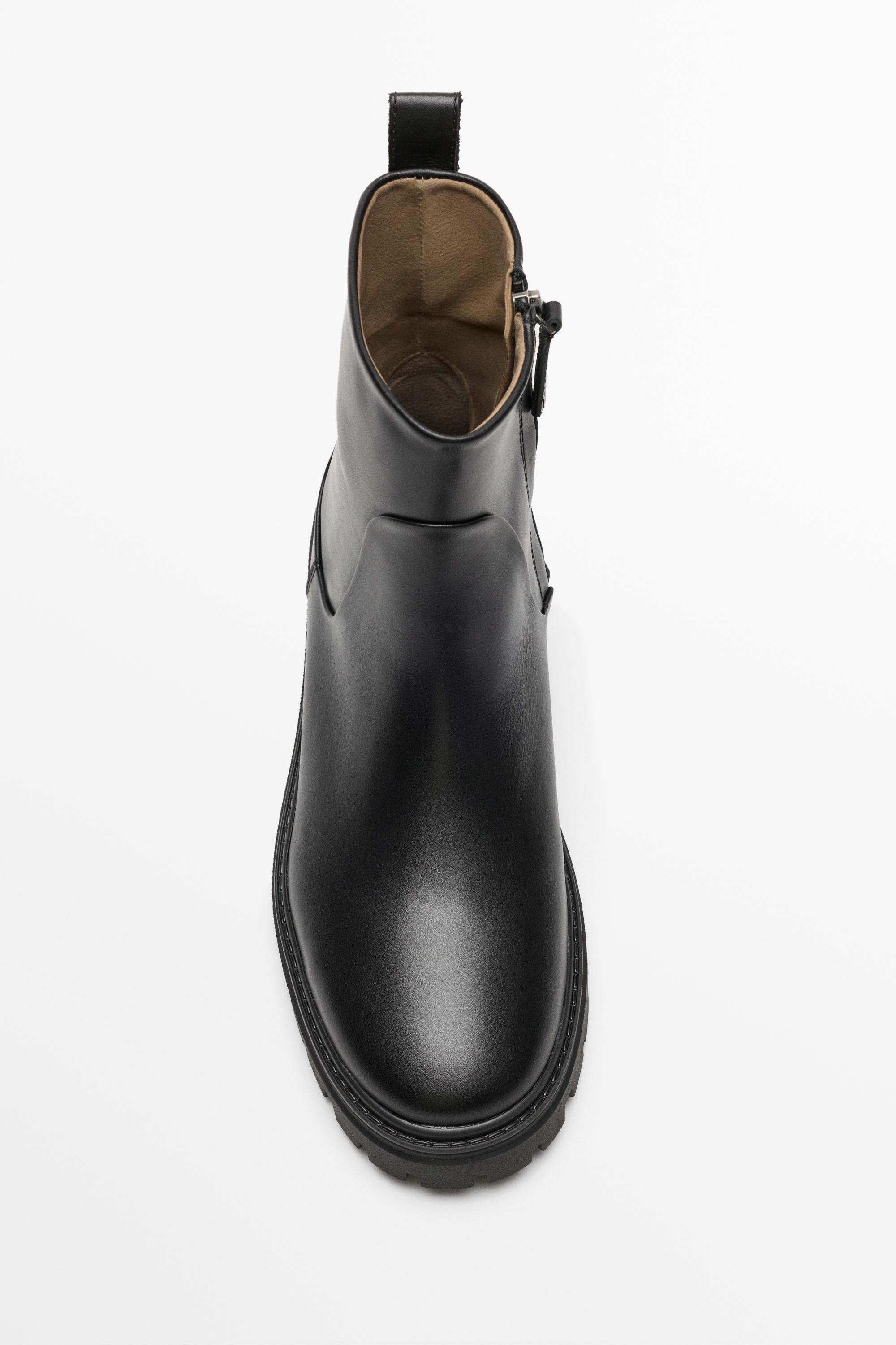 Flat leather ankle boot with track sole