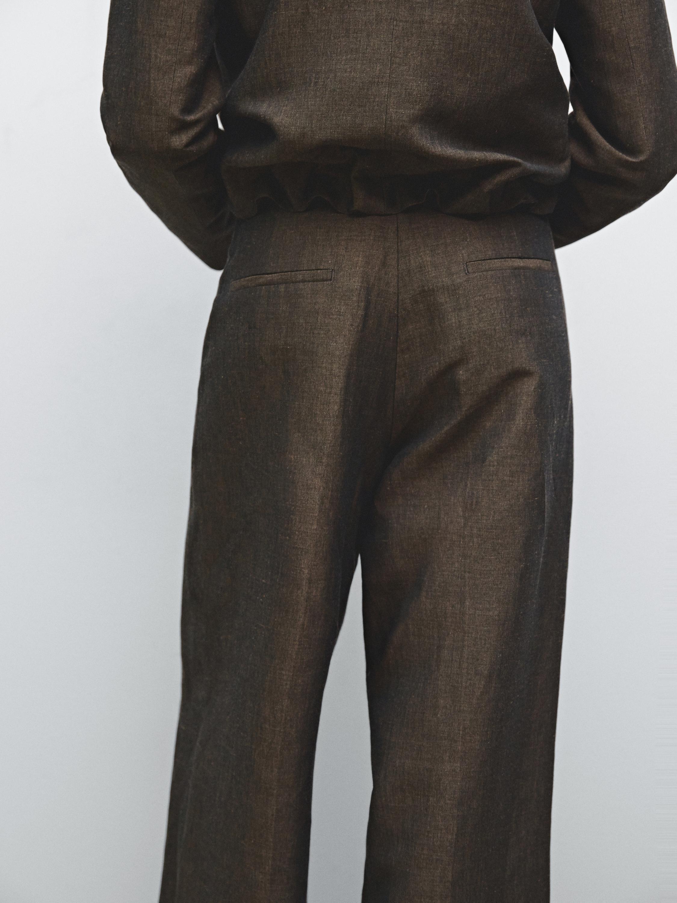 Flowing linen blend trousers with pleats
