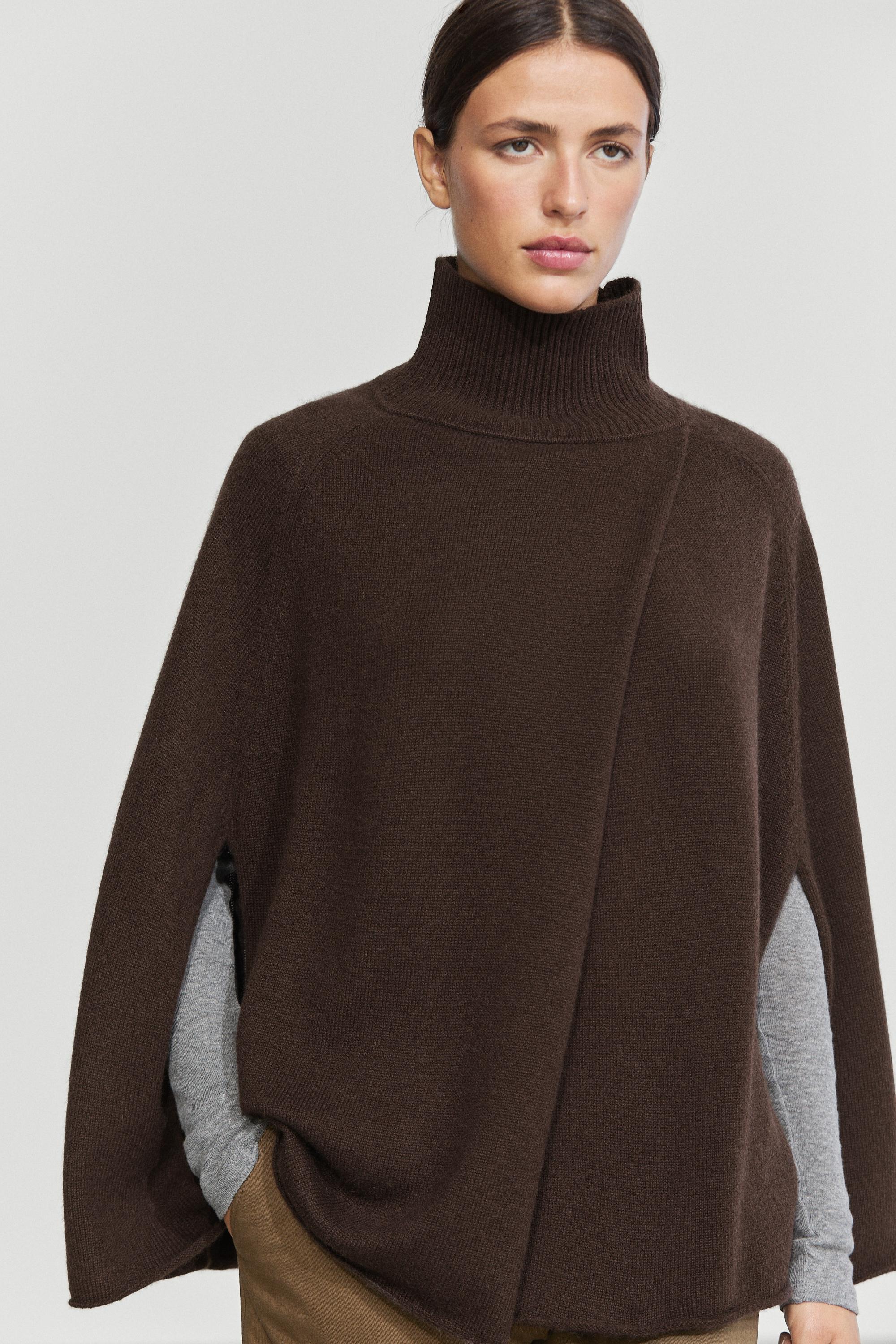 100% cashmere knit cape with crossover detail