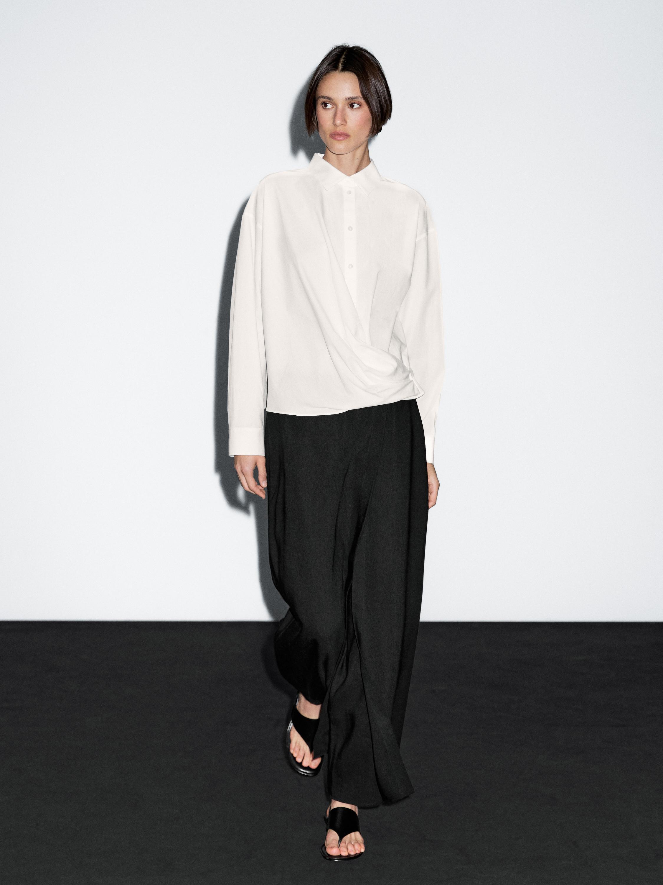 100% cotton shirt with draped asymmetric hem