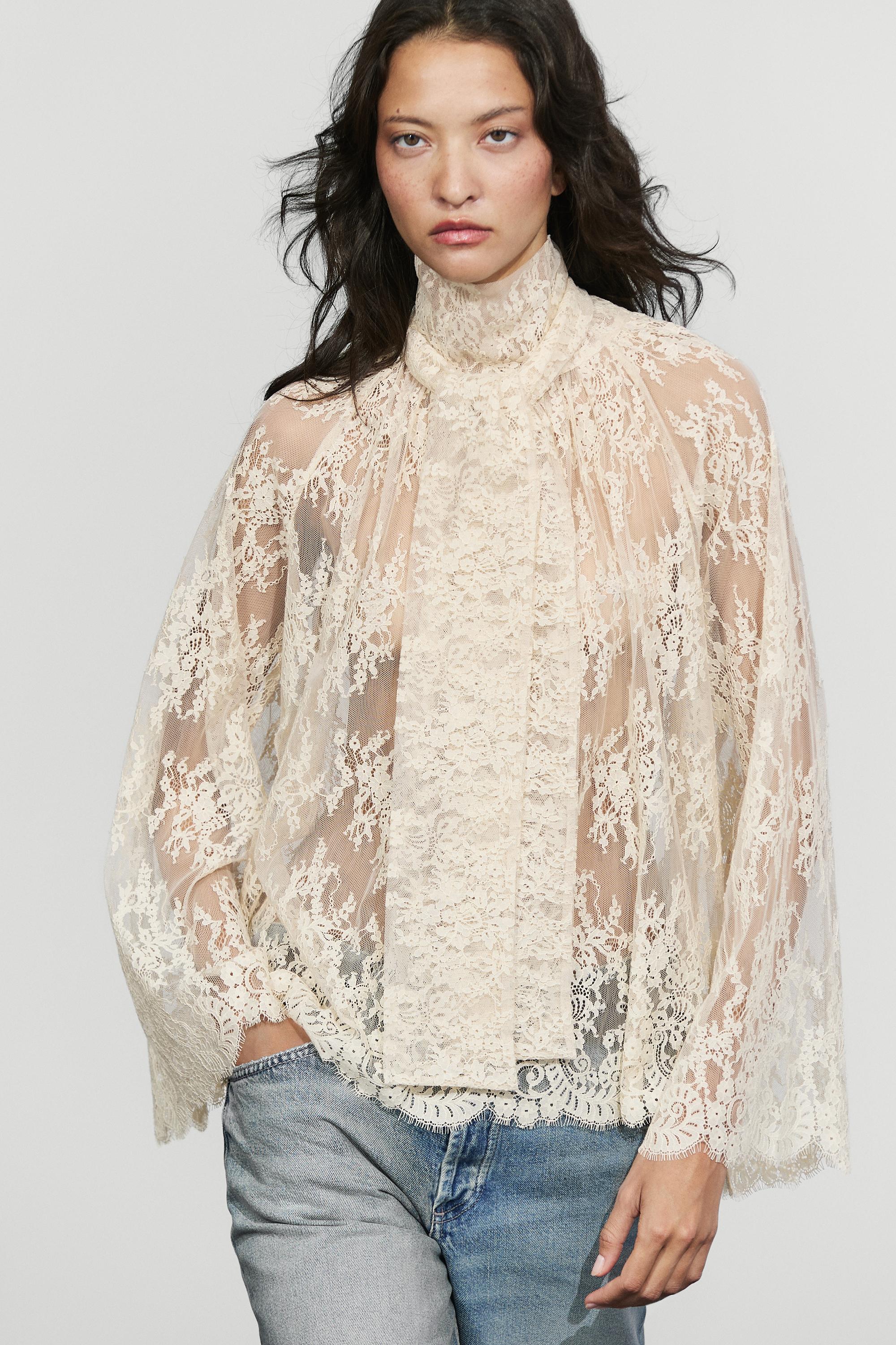 Flowing lace blouse with tie