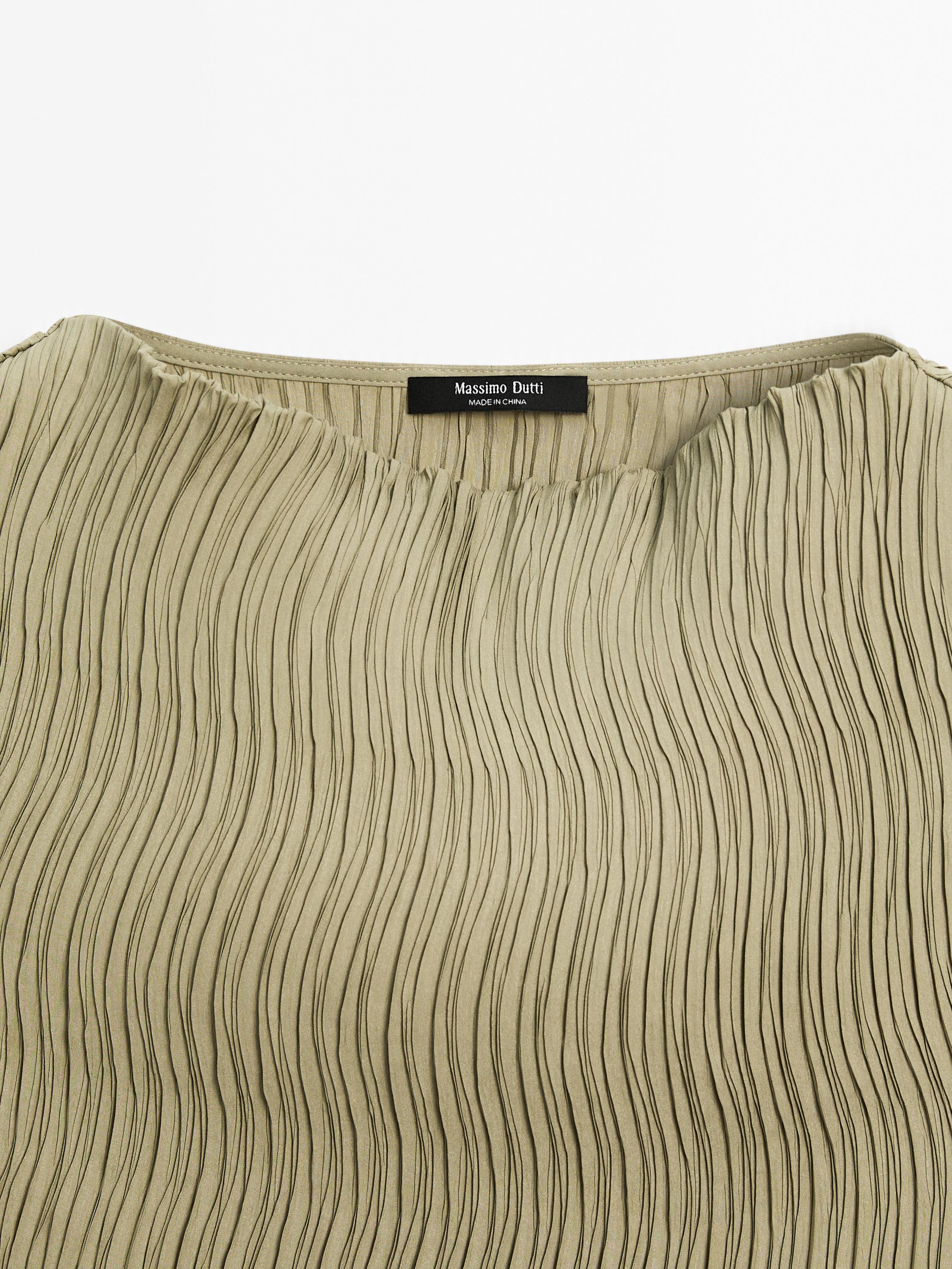 Creased-effect pleated top