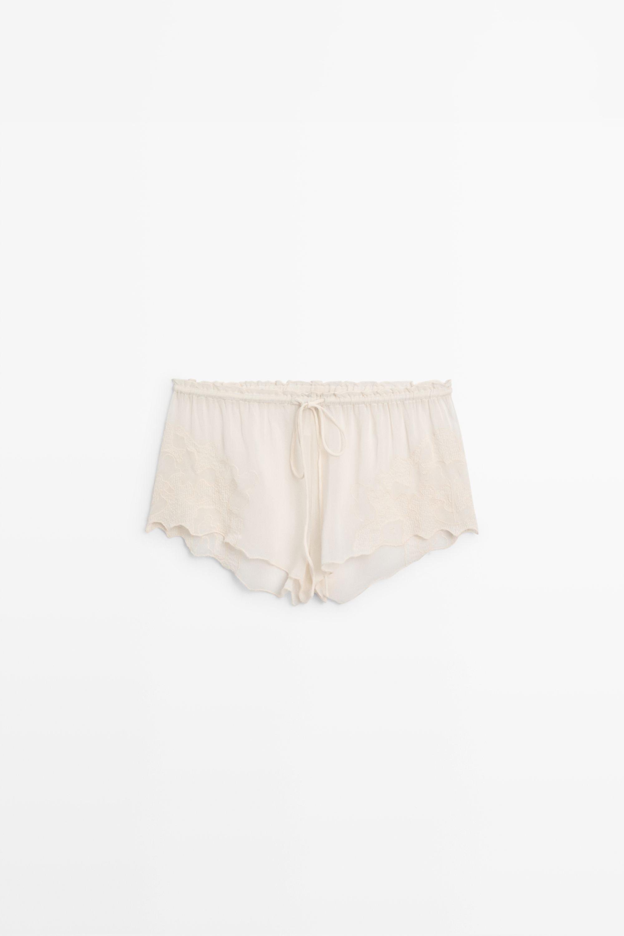 Flowing shorts with embroidered detail — CREAM
