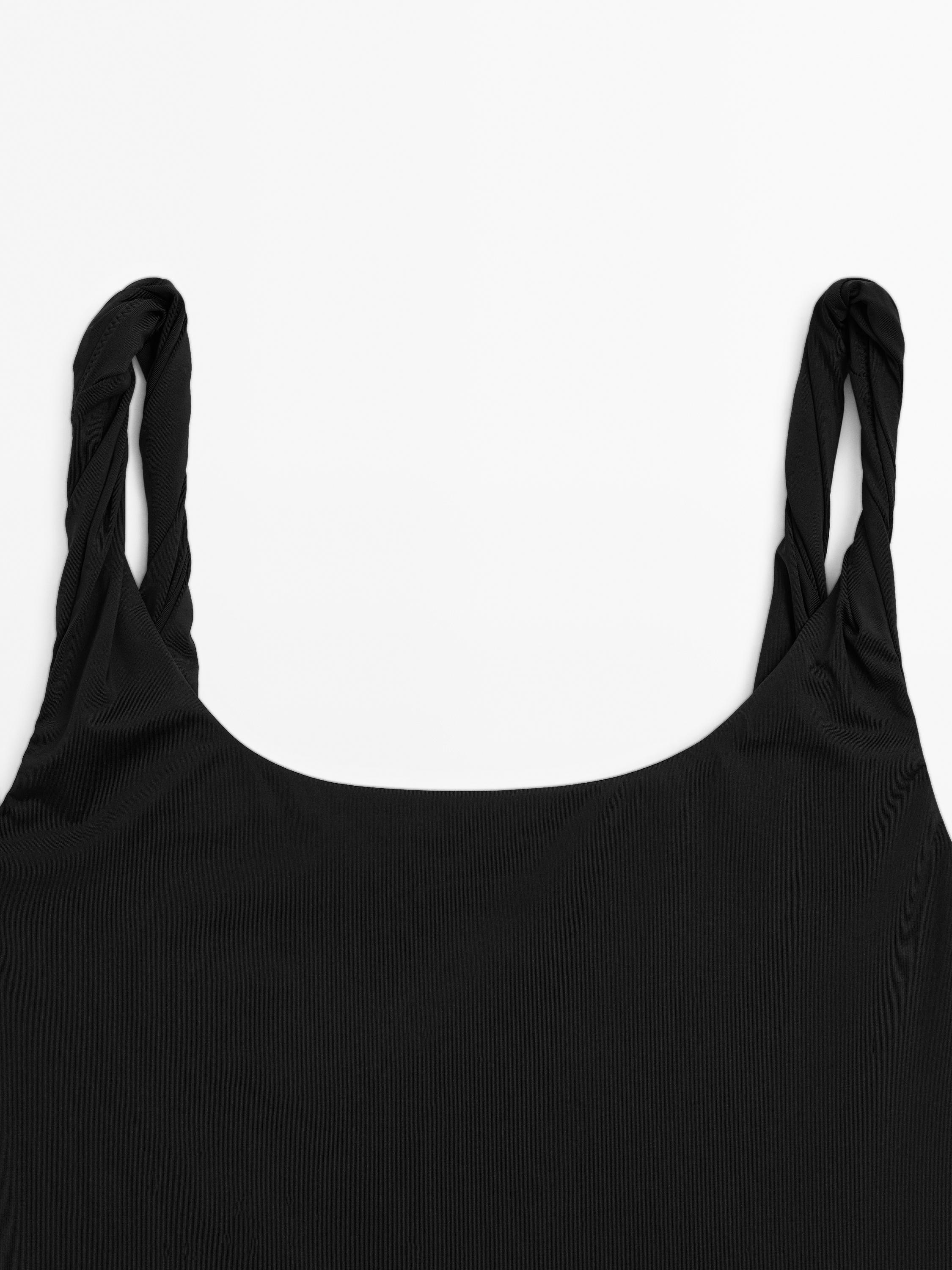 Swimsuit with rolled straps