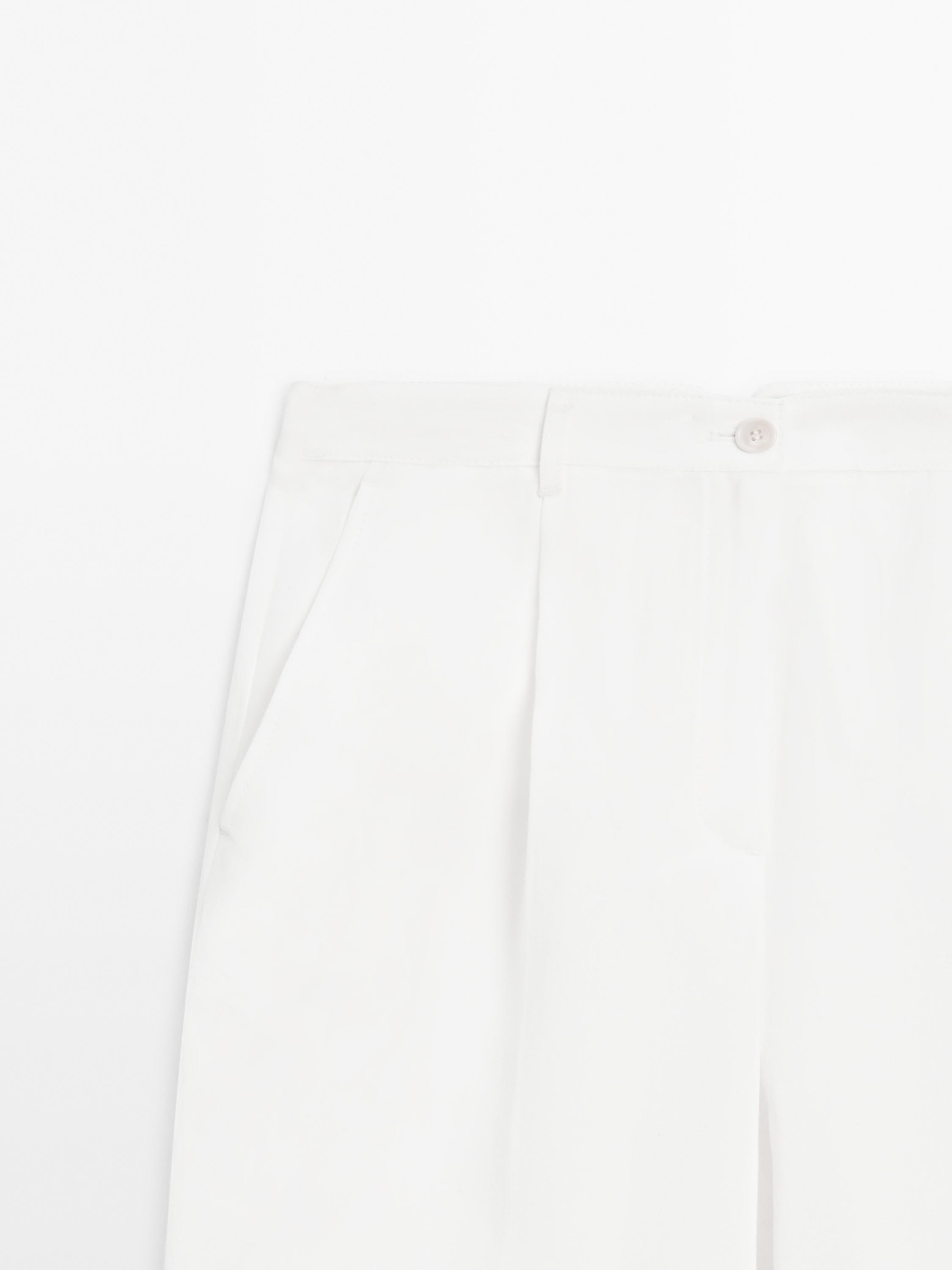 Linen blend trousers with buckle detail