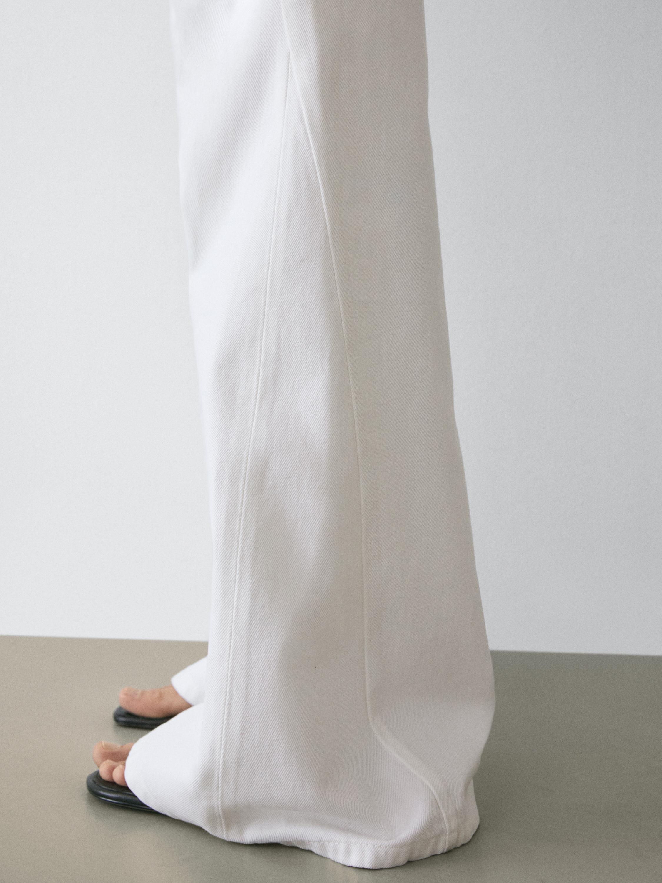 High-waist flare fit jeans — Off white