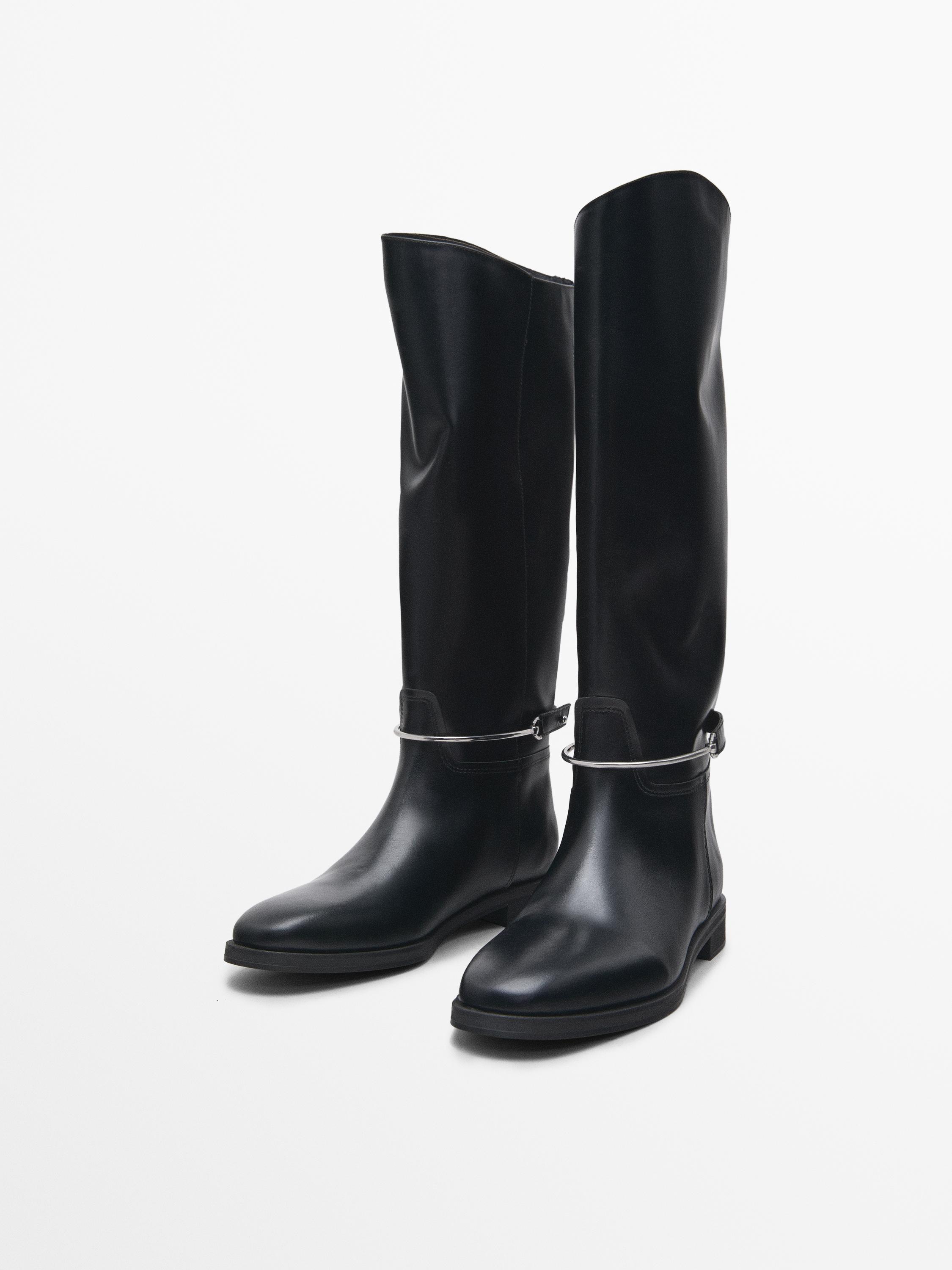 Riding-style boots with detachable embellishment